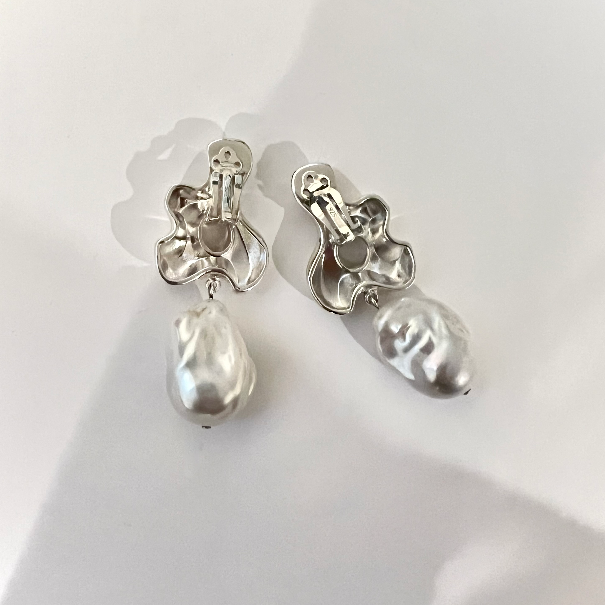 AGMES 0.925 sterling silver clip on earrings with pearl drop. Simone Bodmer clip on