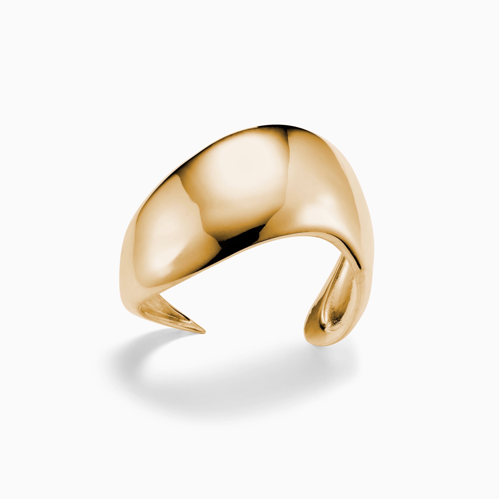 AGMES gold vermeil sculpted Cecil cuff bracelet.