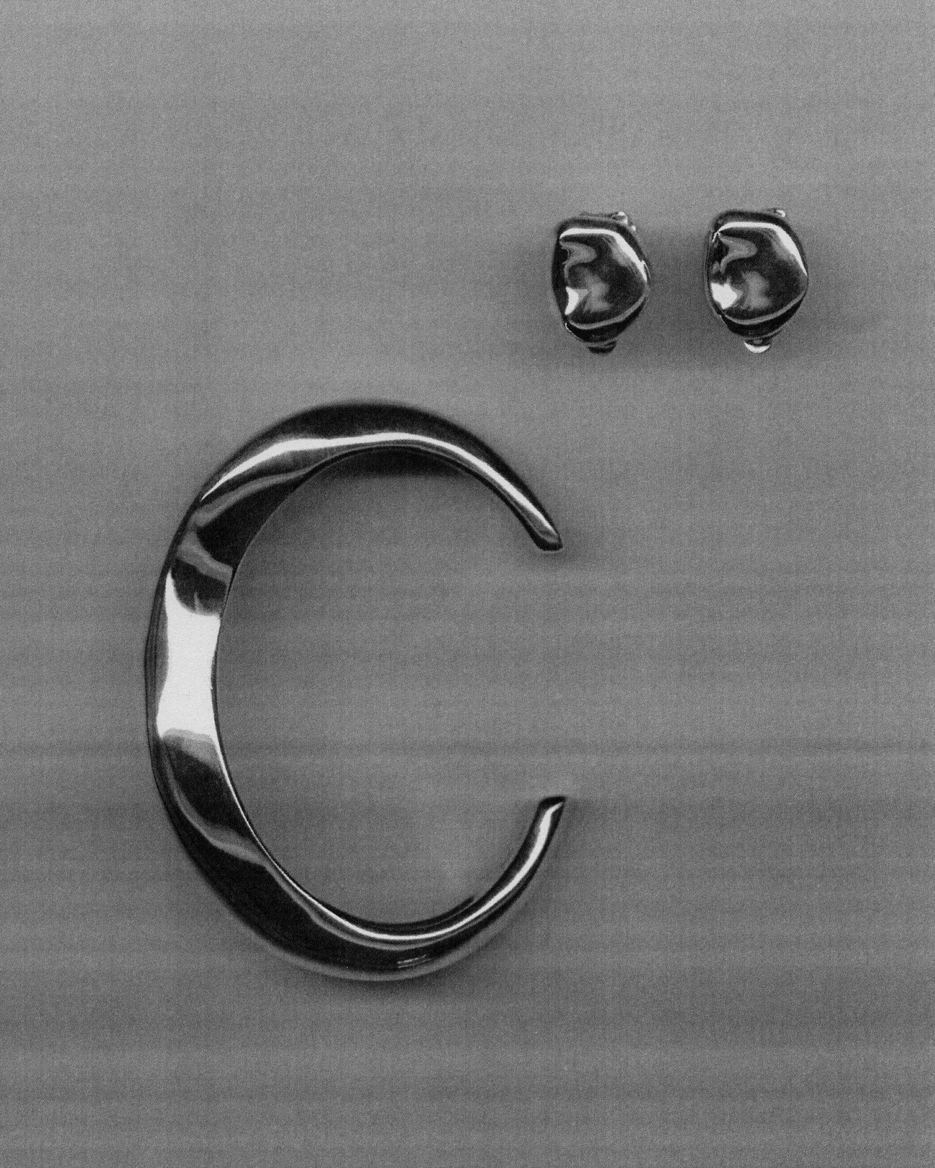 AGMES 0.925 sterling silver large Astrid sculpted cuff bracelet. Gia Clip-On Earrings.