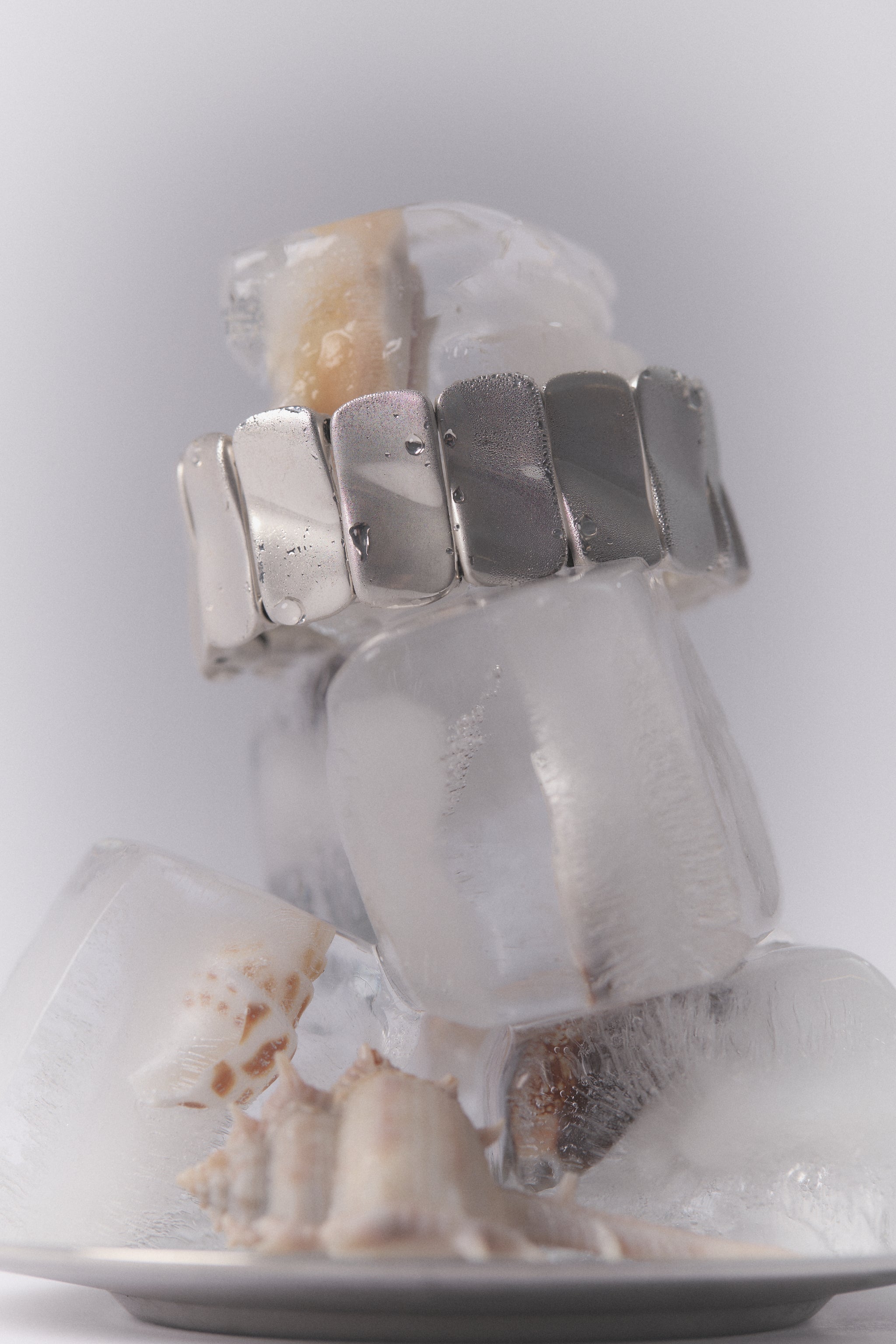 AGMES .925 sterling silver sculptural Short Ilona Bracelet displayed on icicles.