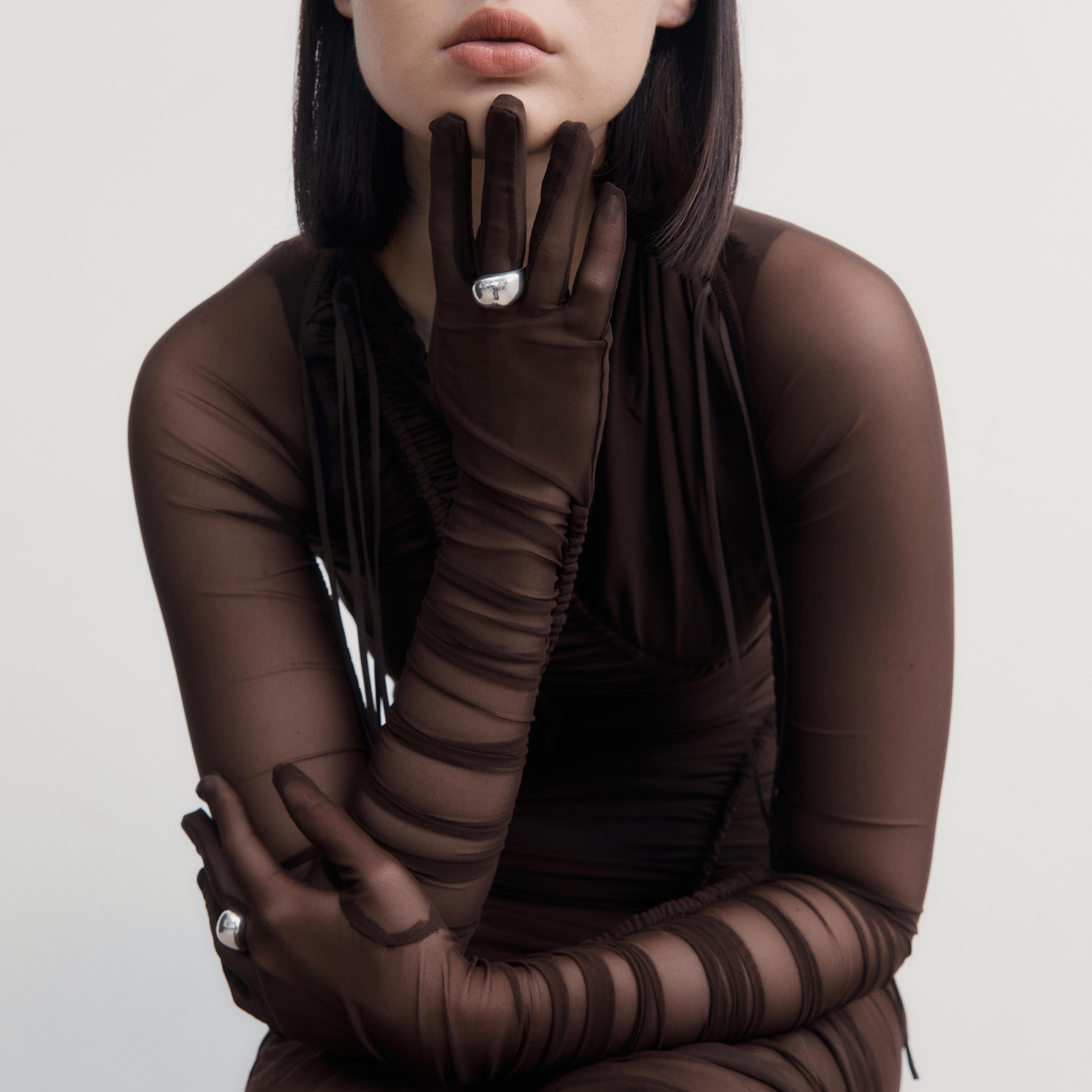 Woman wearing the AGMES .925 Sterling Silver Sienna Ring.