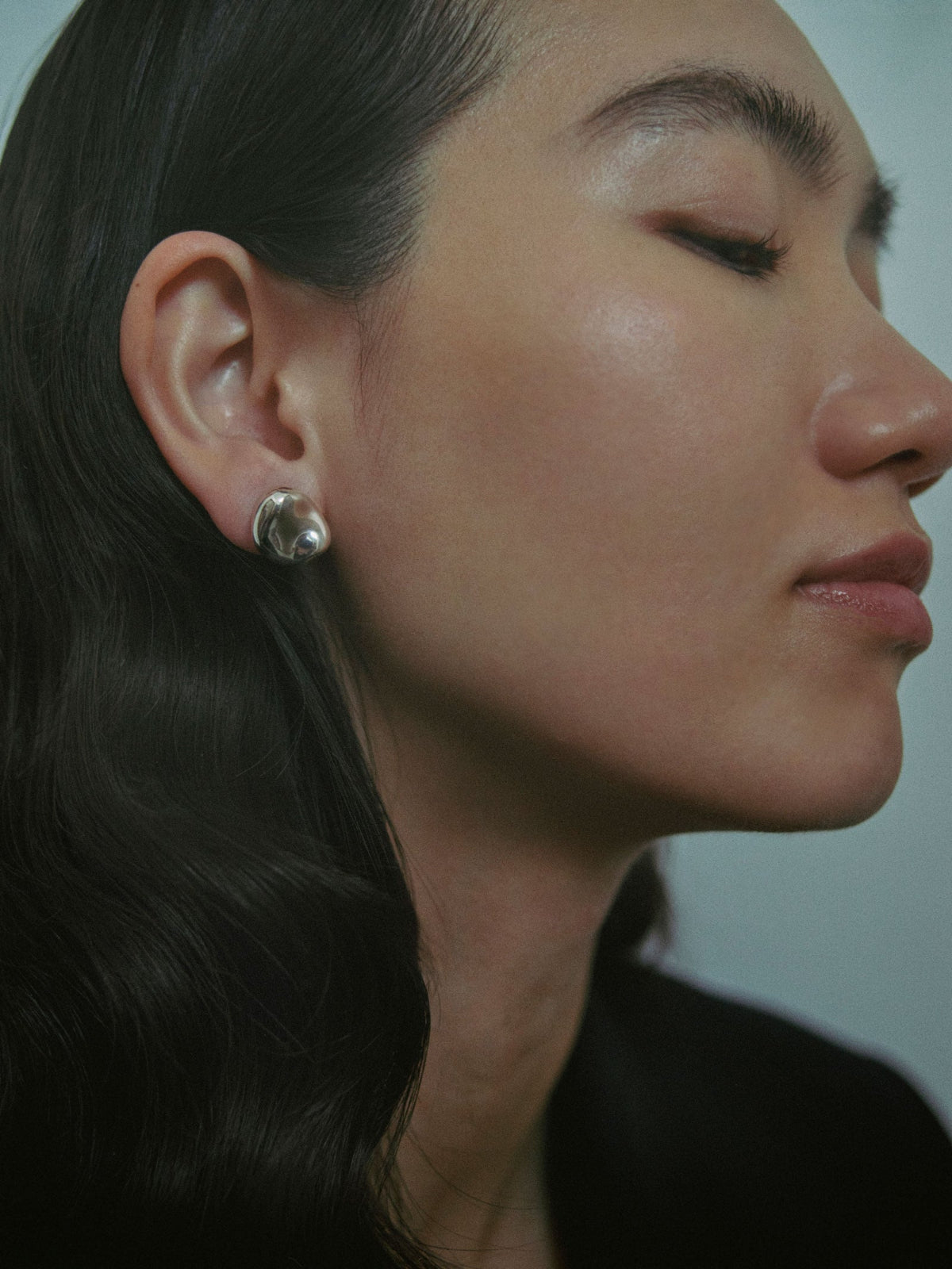 AGMES 0.925 sterling silver sculpted round stud earrings.