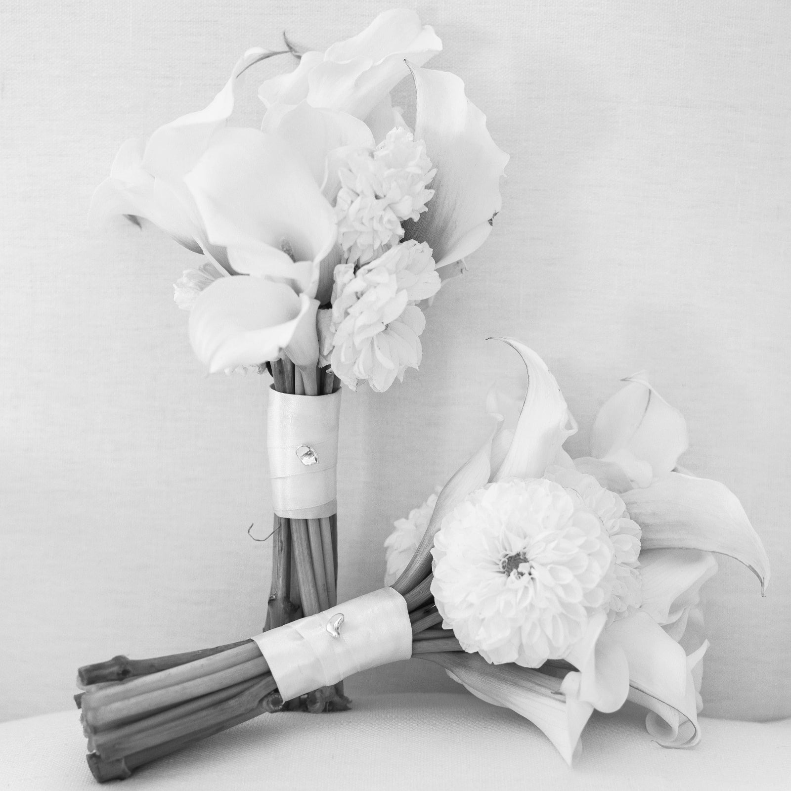 AGMES .925 Sterling Silver Sum of Parts Mini Brooch displayed on bouquets.