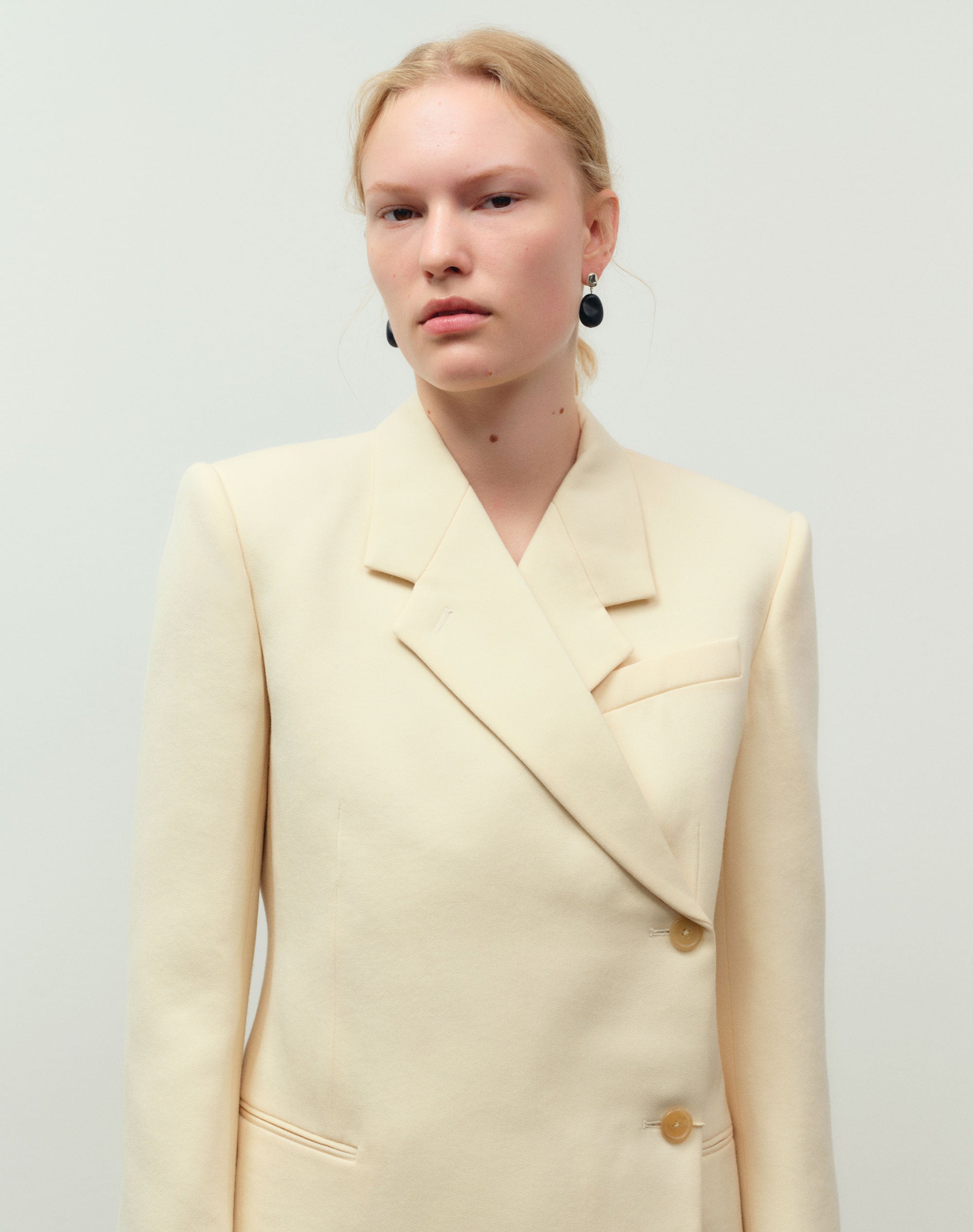 AGMES .925 sterling silver earrings with black onyx bead drop on model