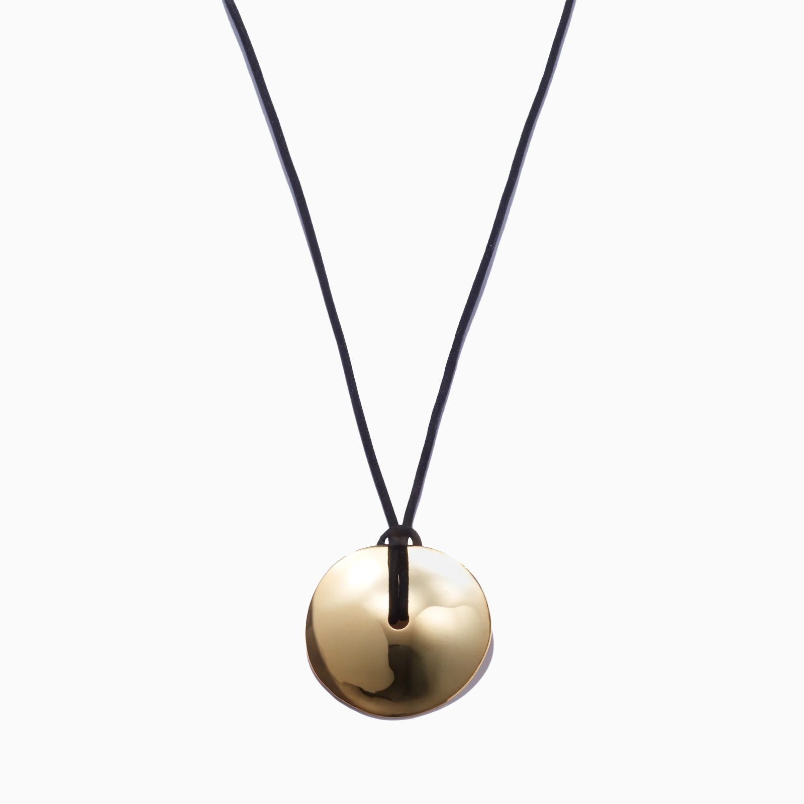 AGMES 18K Gold Vermeil Cora Pendant paired with Black Suede Cord. Round Pendant Necklace on white background.