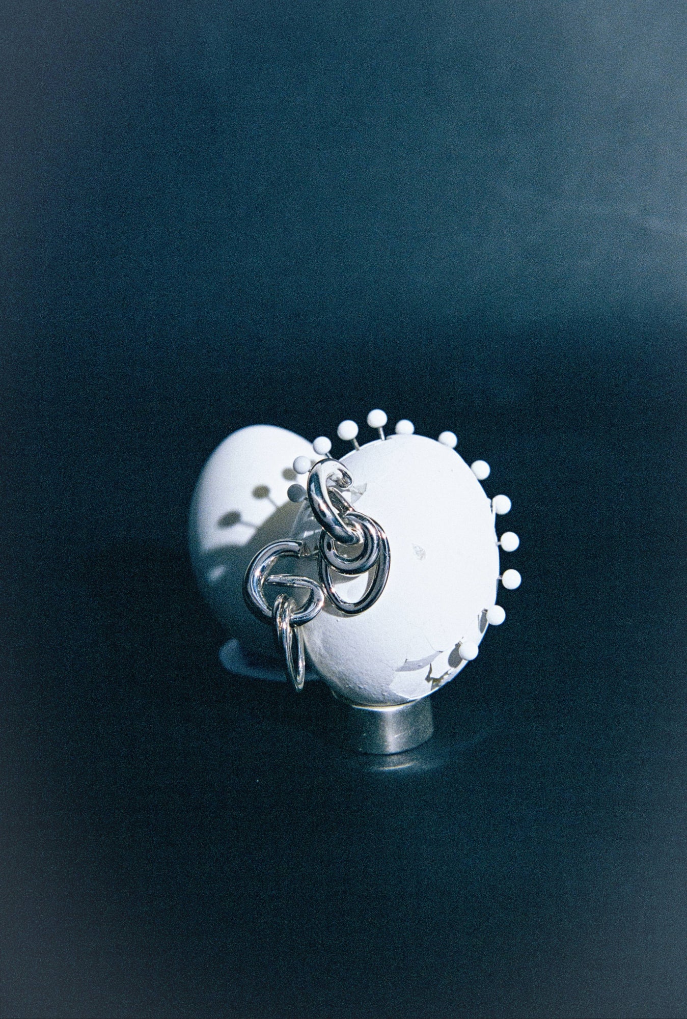 .925 STERLING SILVER ELLIPSES HOOP EARRINGS PINNED ON EGGS STILL LIFE