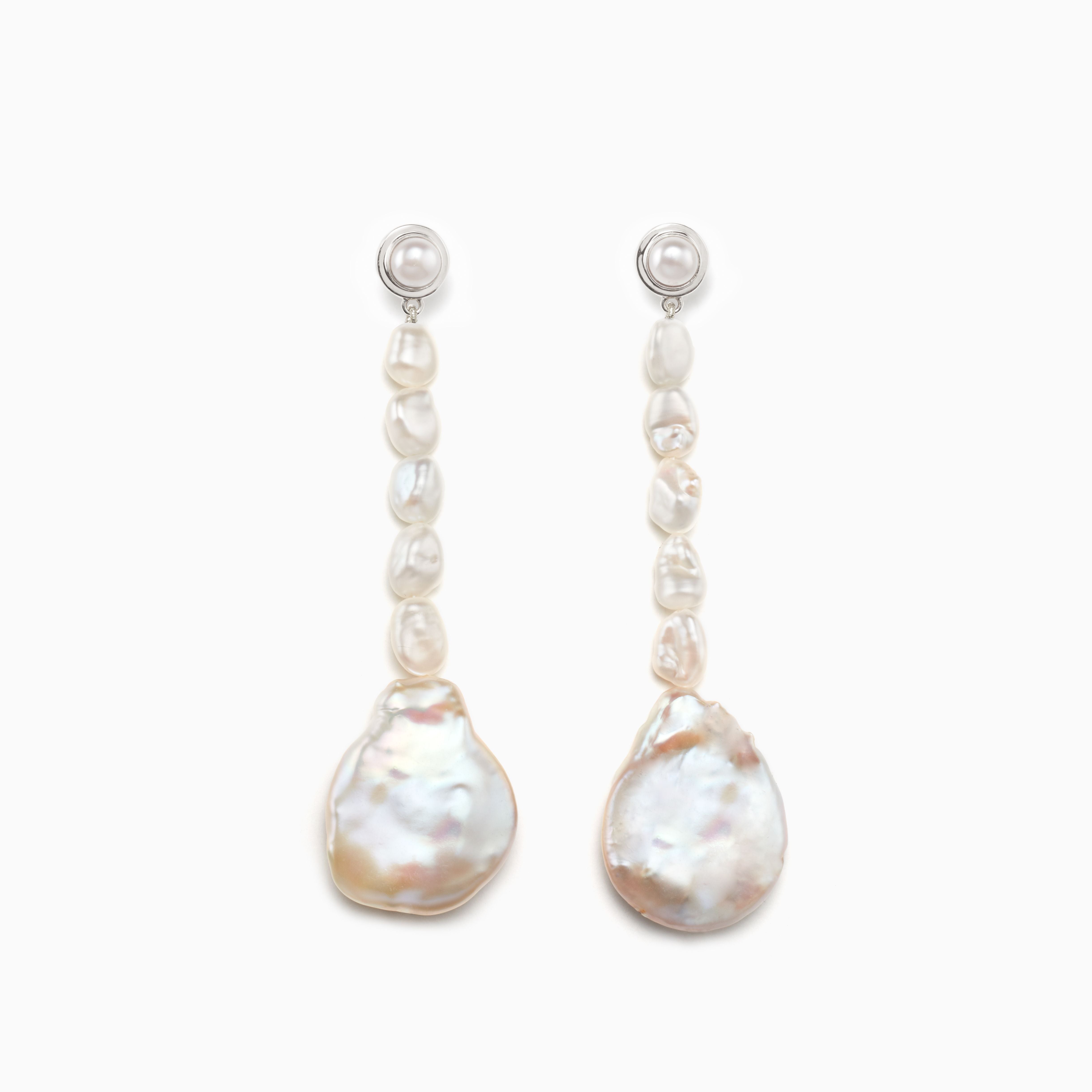 AGMES pearl drop earrings 0.925 sterling silver on white background.