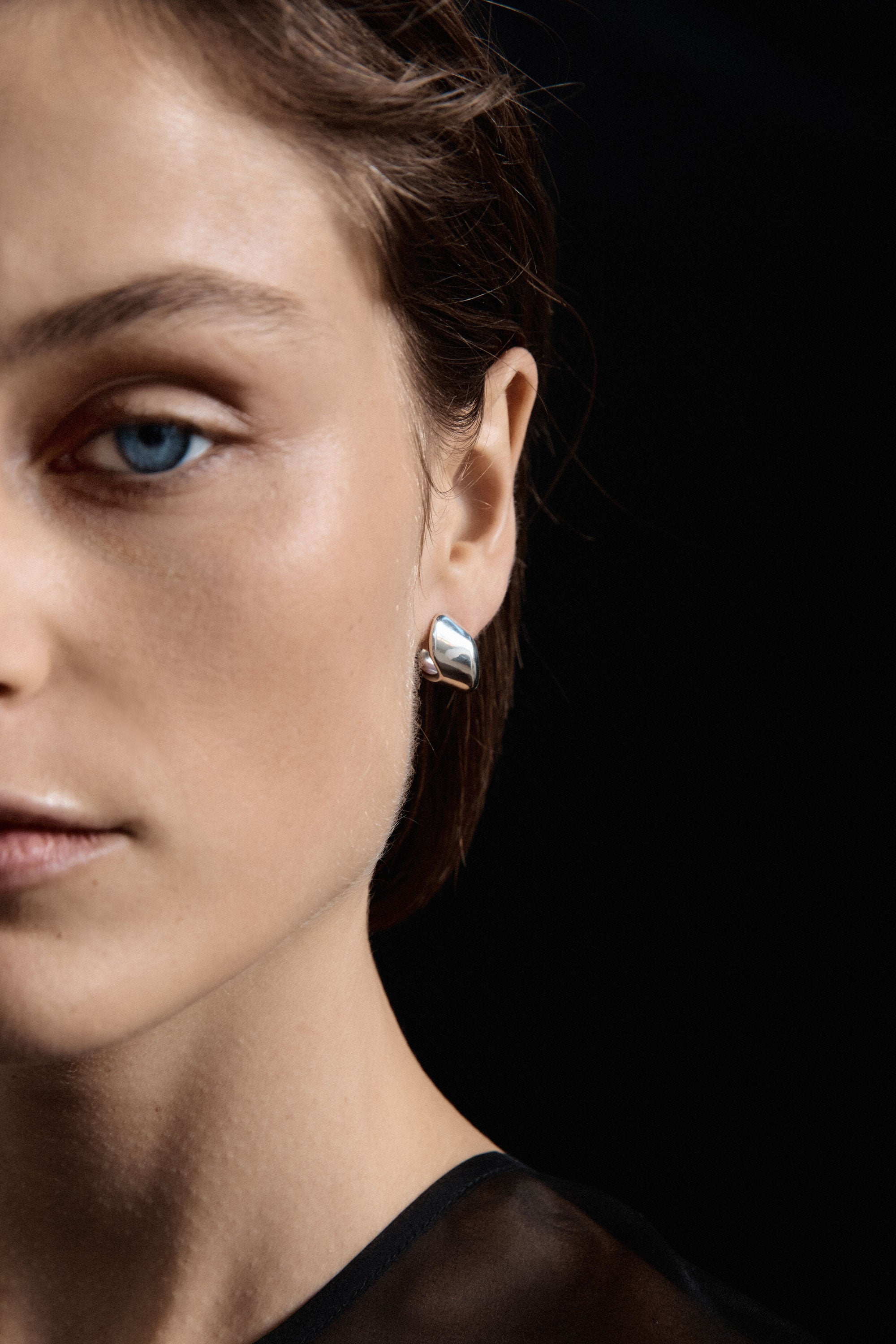 AGMES .925 Sterling Silver Nelle Hoop Earrings. Asymmetrical mirrored hoops.