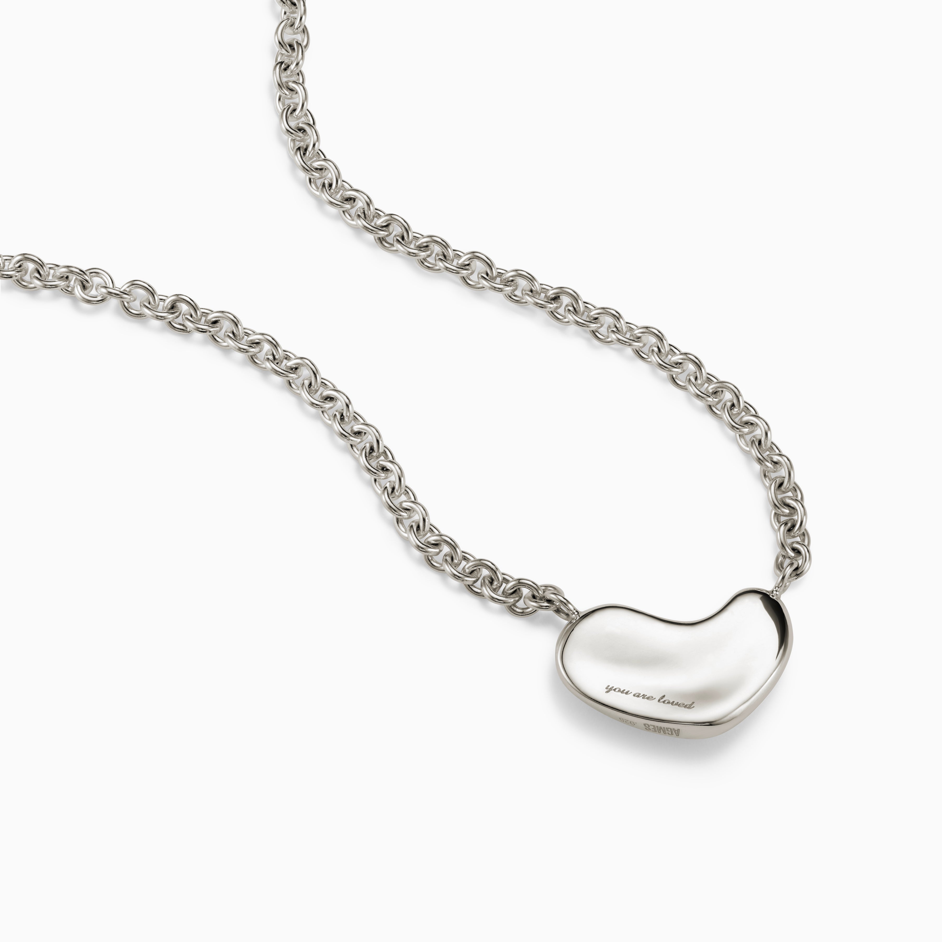 AGMES .925 Sterling Silver Small Sculpted Heart Pendant II on chain with engraving.