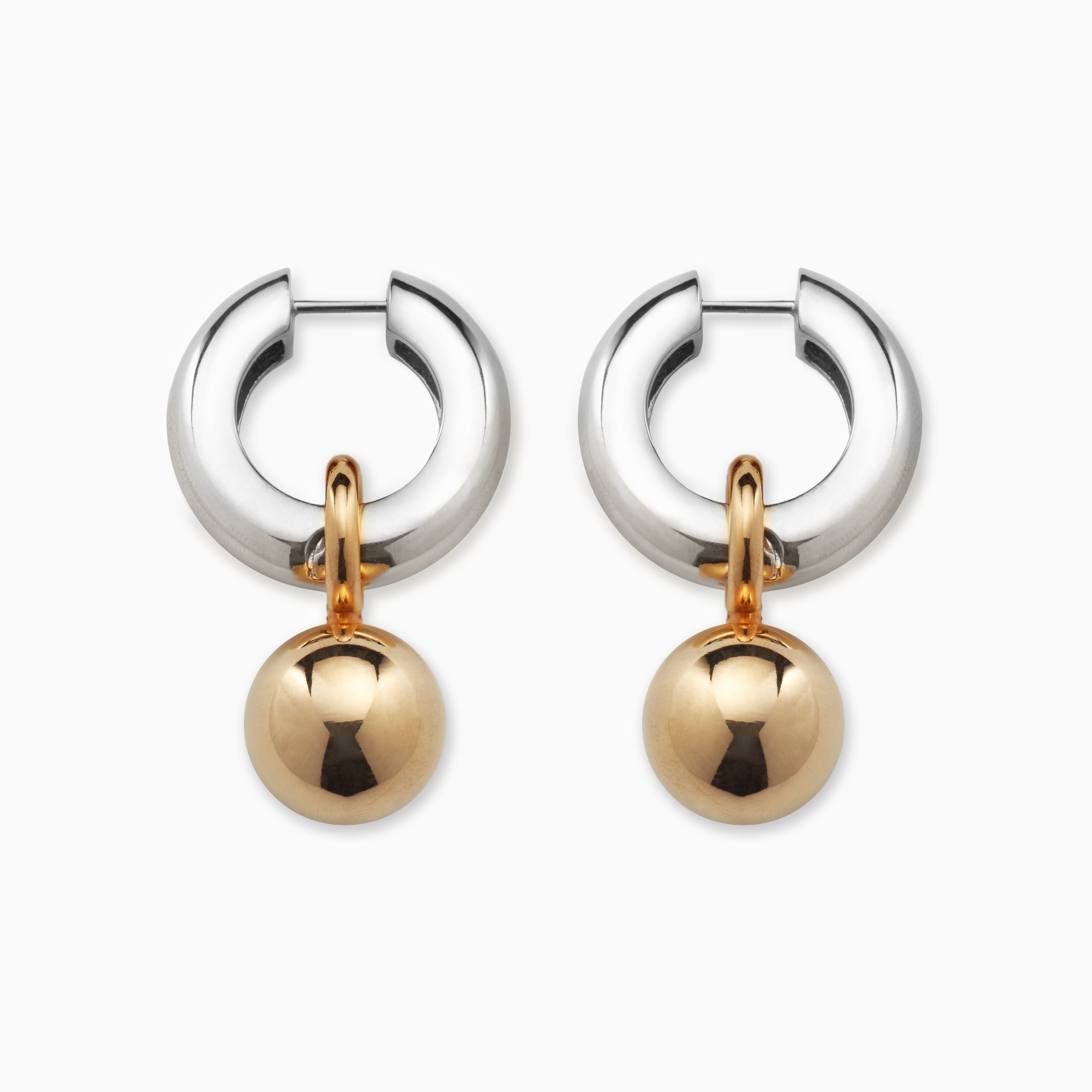 AGMES 0.925 sterling silver hinged hoop earrings with 18k yellow gold round embellishments.