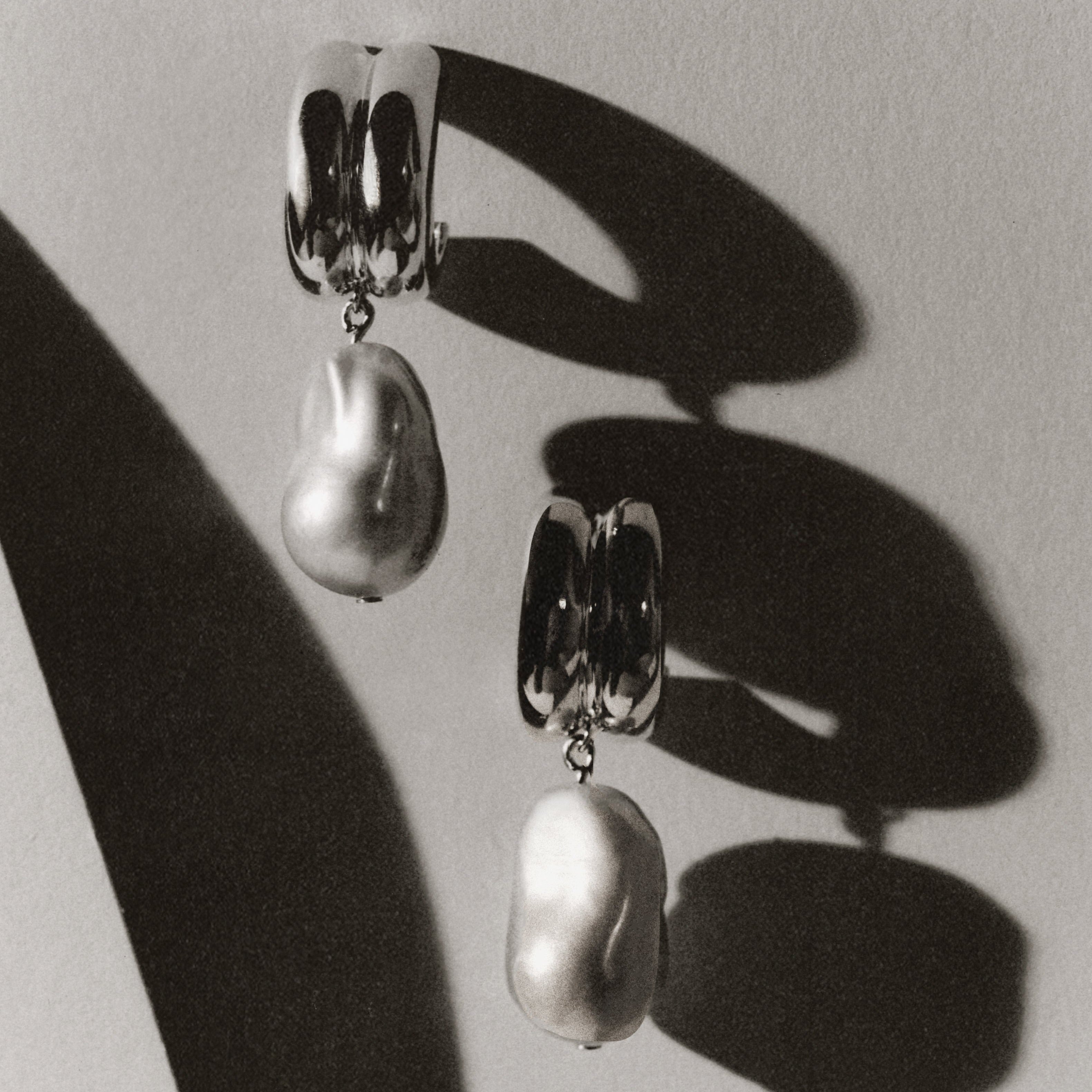 AGMES 0.925 sterling silver baroque Juliette earrings with freshwater pearl drop.