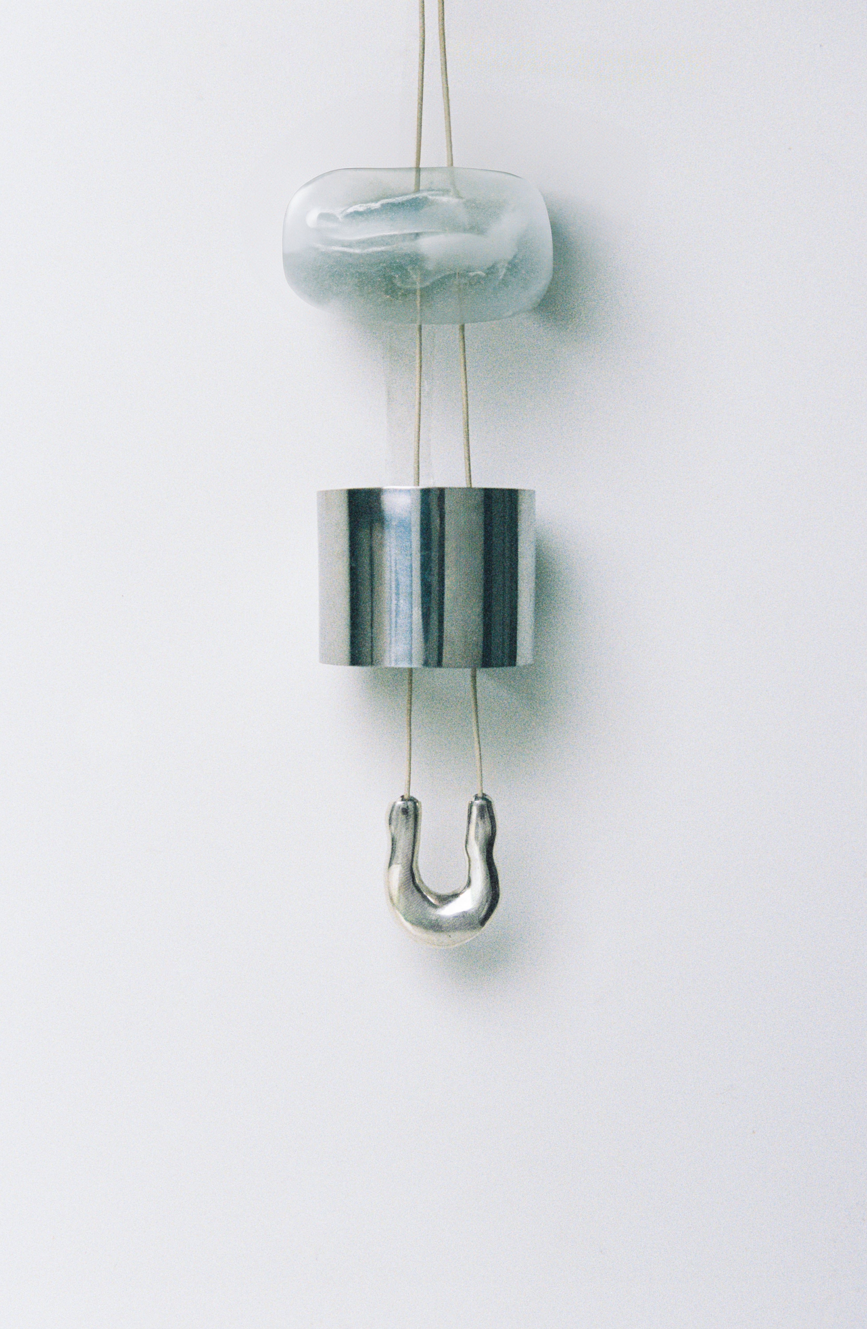 AGMES .925 sterling silver wishbone pendant on Ivory Satin cord.