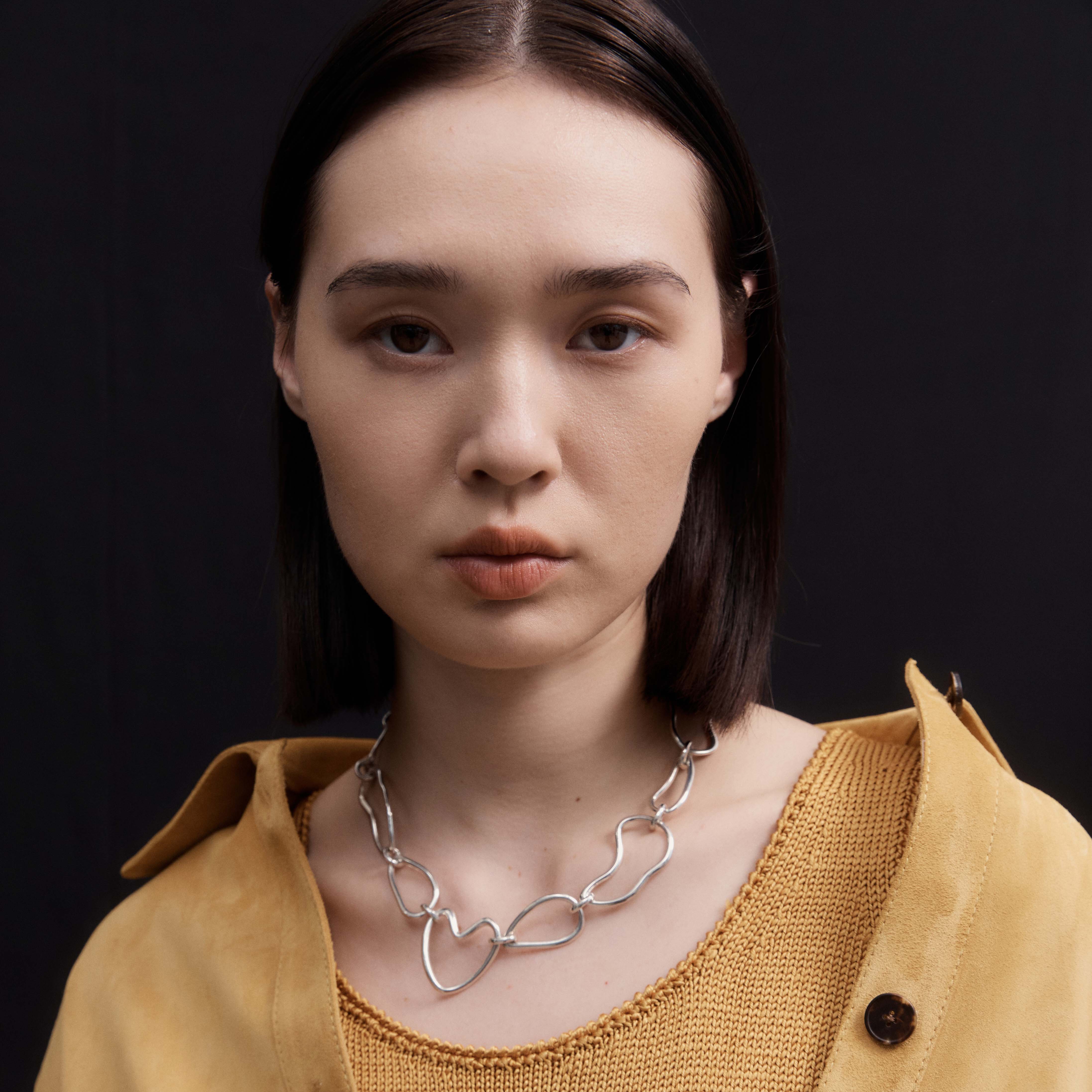 Woman wearing AGMES 0.925 Sterling Silver Altun Necklace