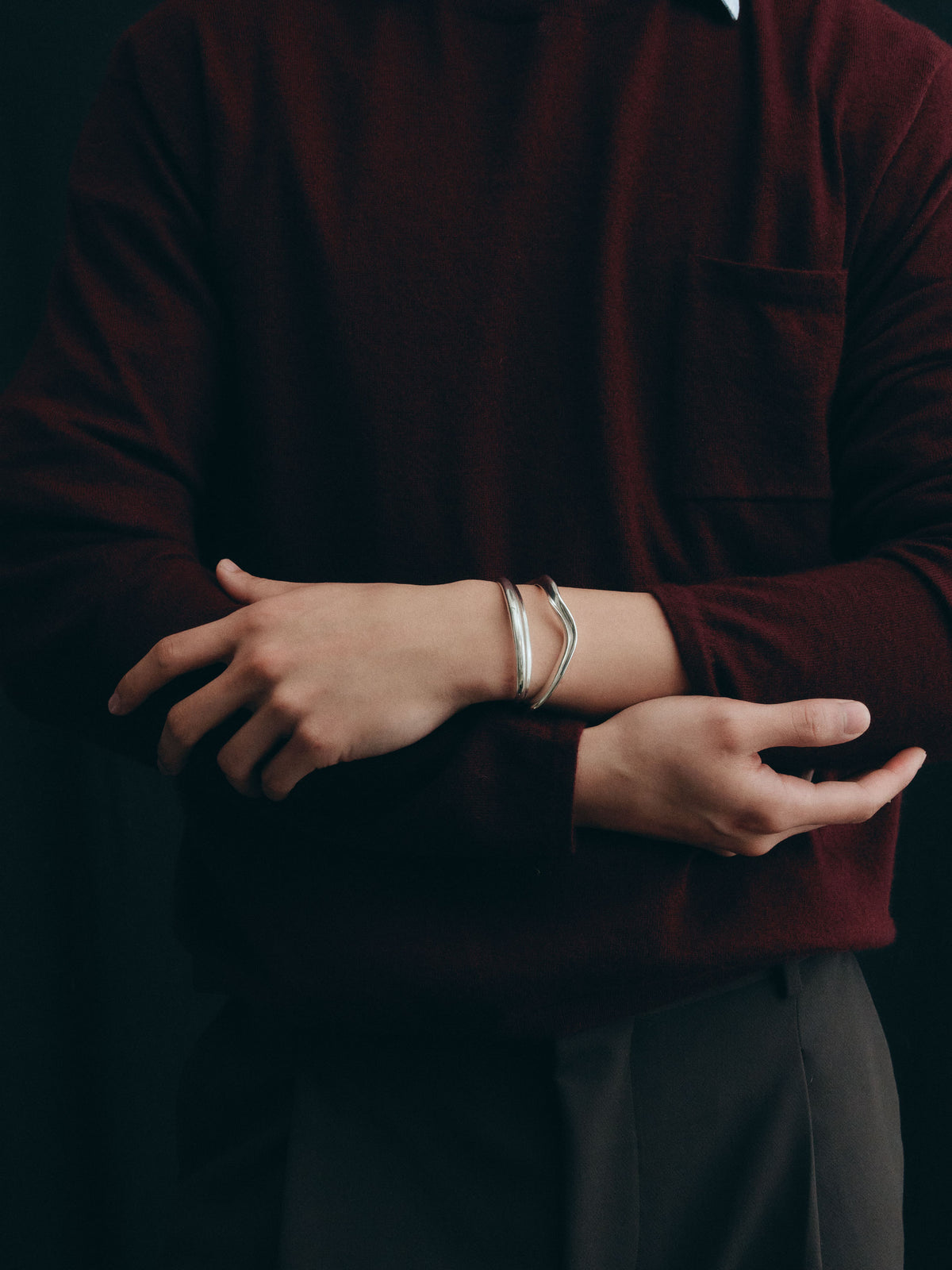 male model wearing .925 sterling silver AGMES cyril thin cuff bracelet with small astrid cuff