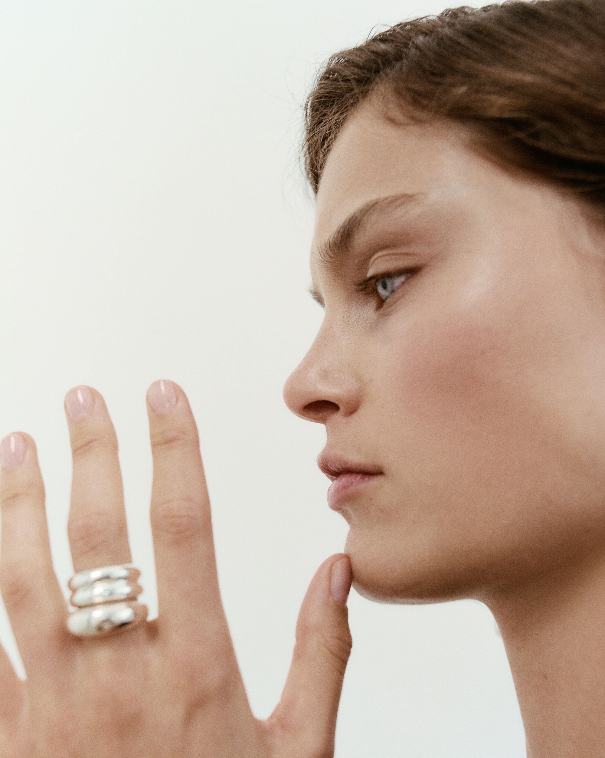 Woman wearing the AGMES .925 Sterling Silver Domed Ridge Ring Set.