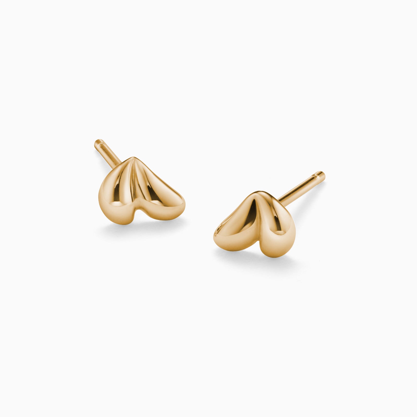 AGMES 18k gold vermeil sculptural heart Mini Lilla Stud Earrings on white background.