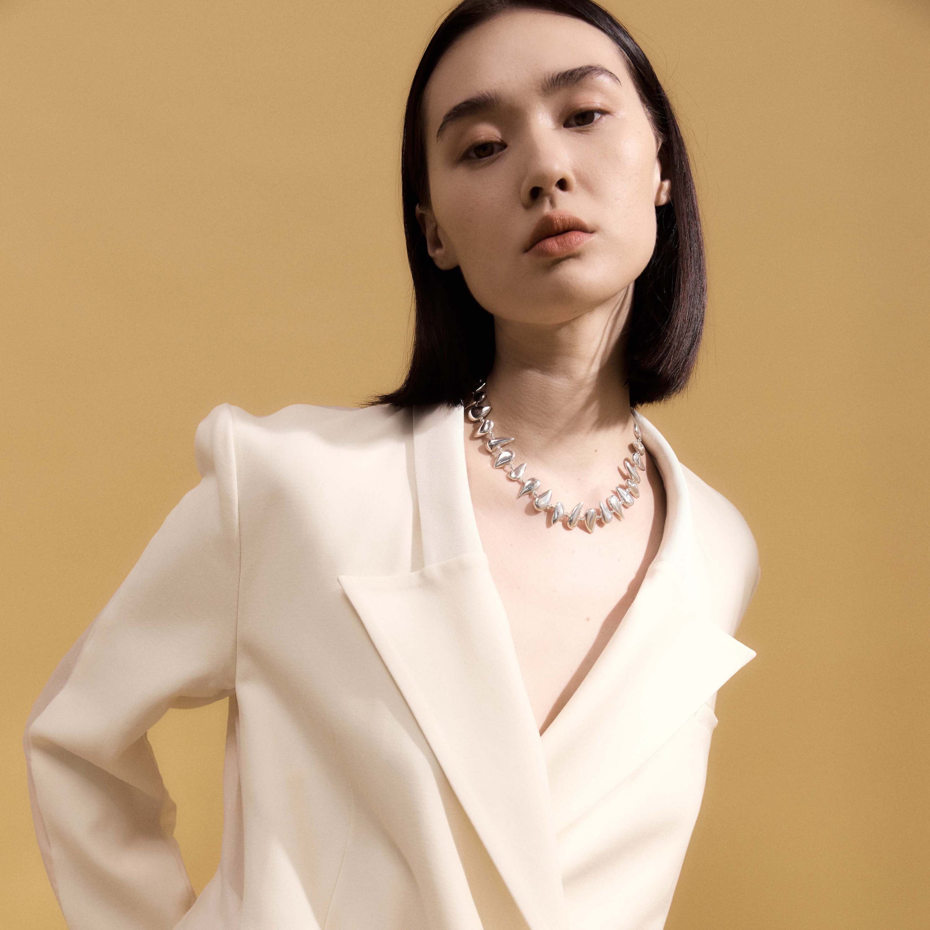 Woman wearing AGMES 0.925 Sterling Silver Flora Necklace.