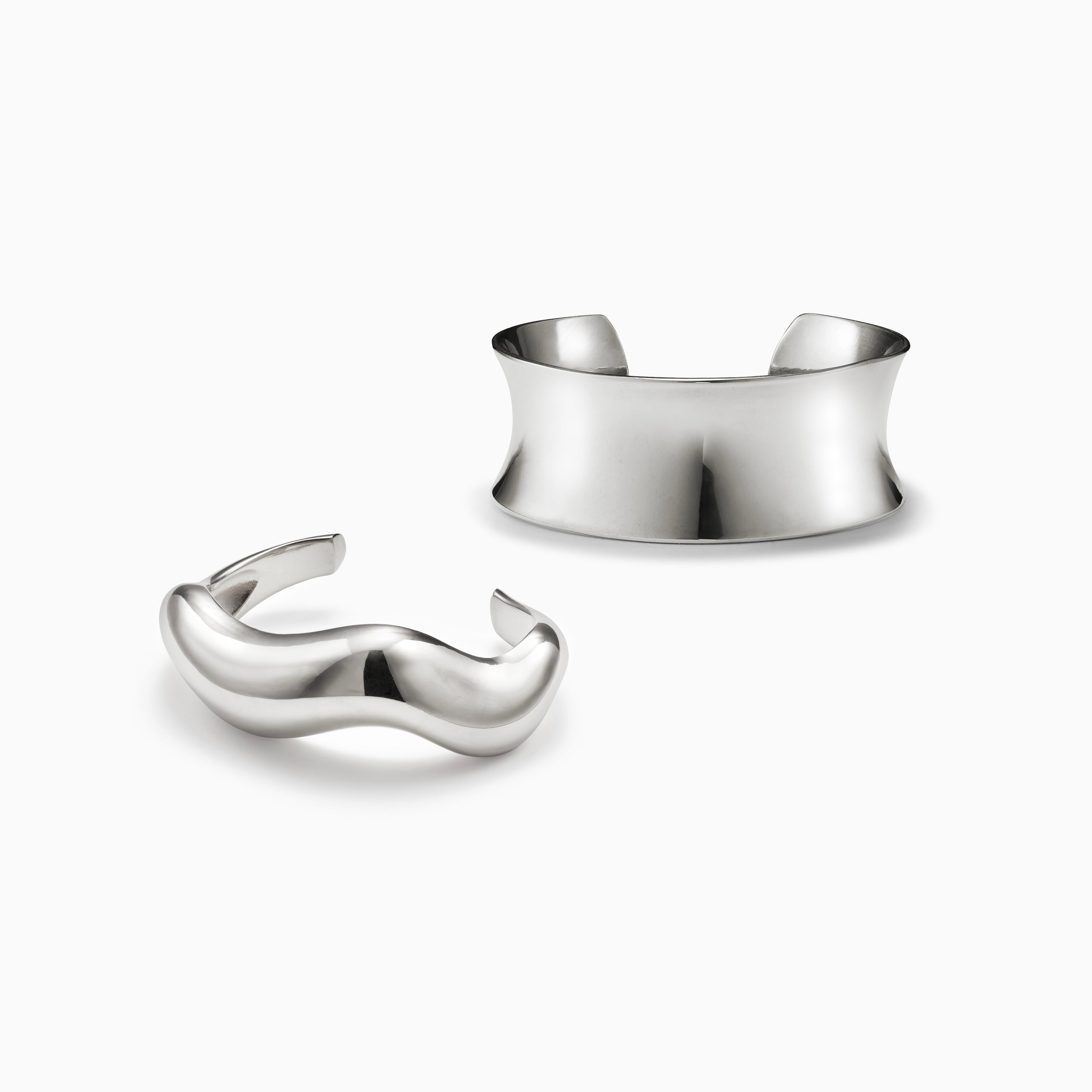 AGMES 0.925 sterling silver sculpted abstract cuff set.