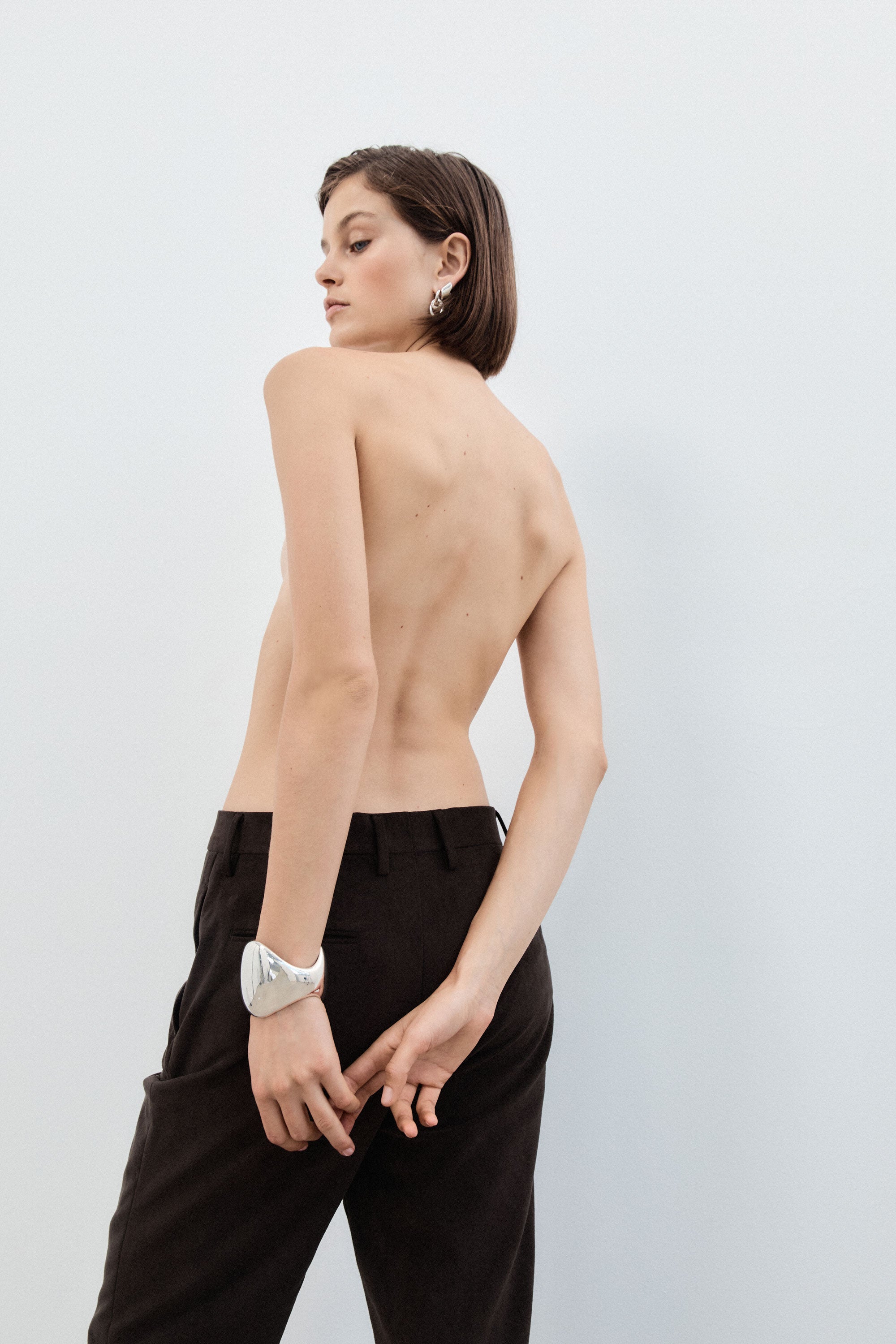 Woman wearing AGMES 0.925 Sterling silver Giselle Cuff. Large Cuff Bracelet.