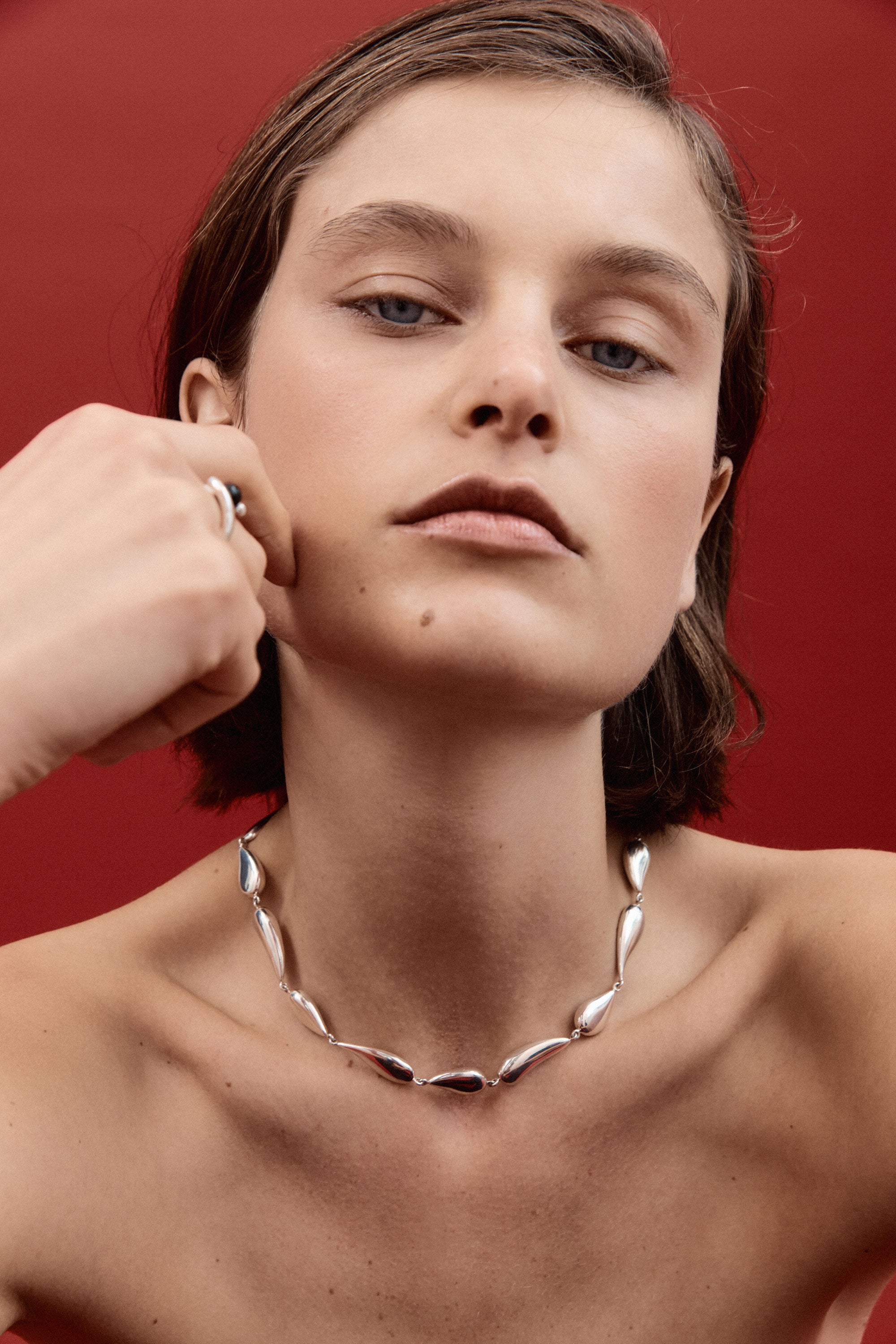 Woman wearing AGMES 0.925 Sterling Silver Ila Necklace.