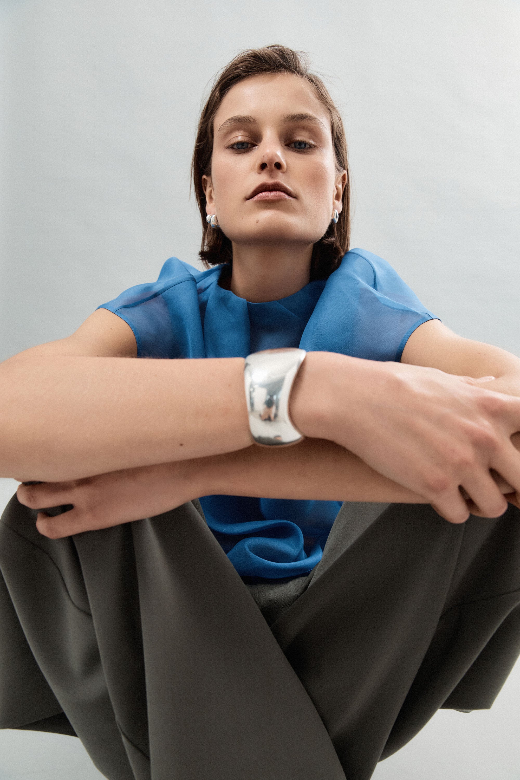 Woman wearing AGMES 925 Sterling Silver Jean Cuff. Large Cuff Bracelet.
