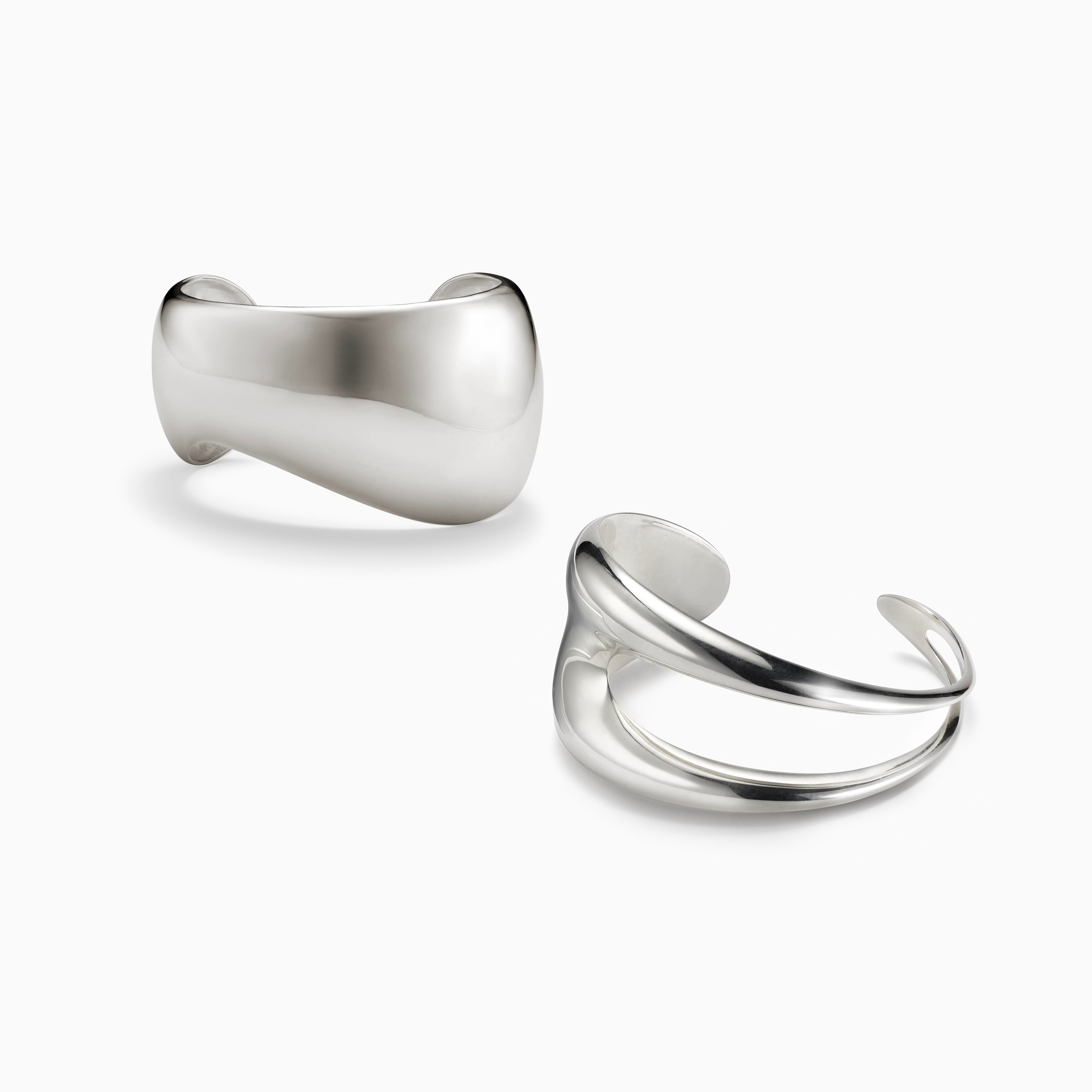 AGMES 0.925 sterling silver sculpted abstract cuff set.