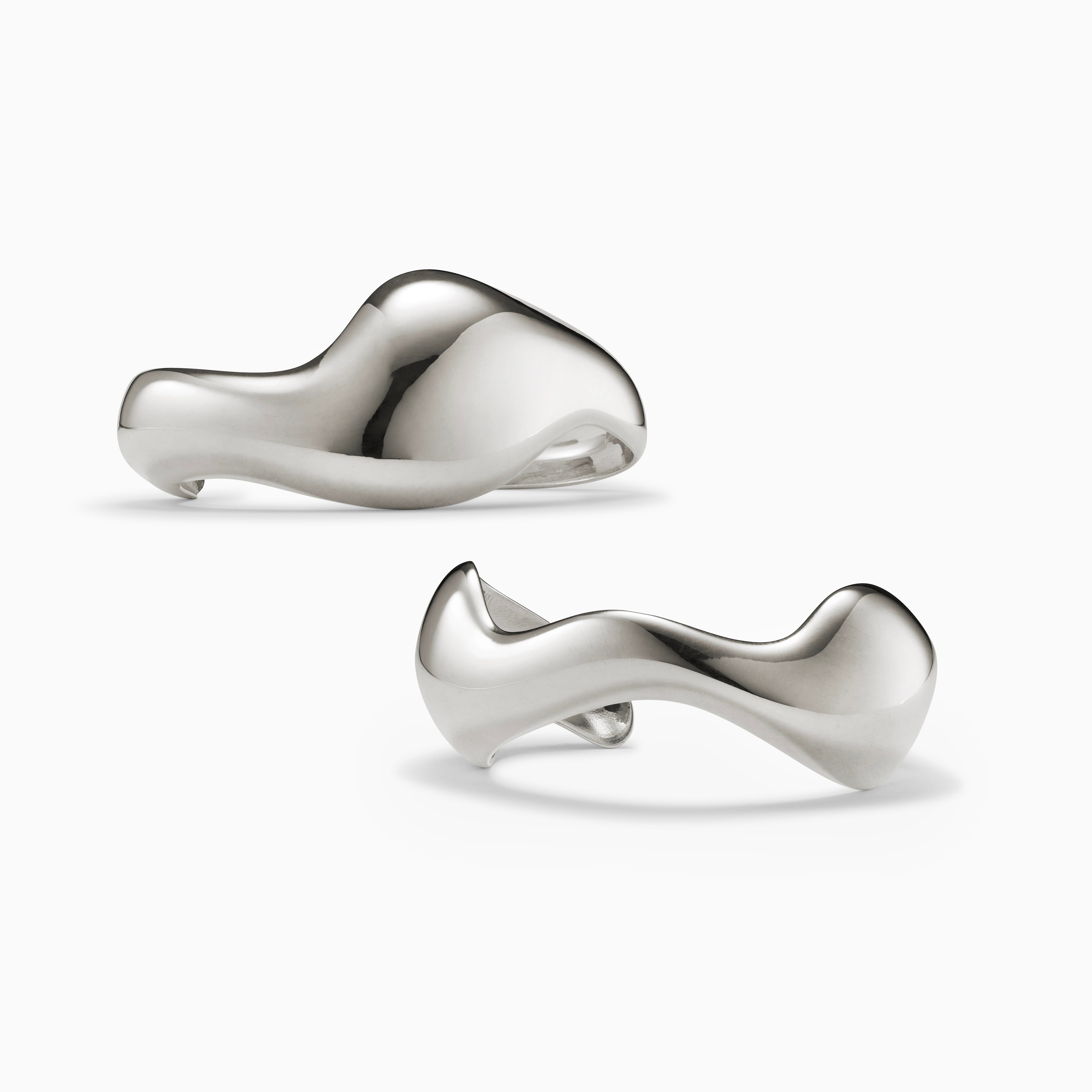 AGMES 0.925 sterling silver sculpted abstract cuff set.