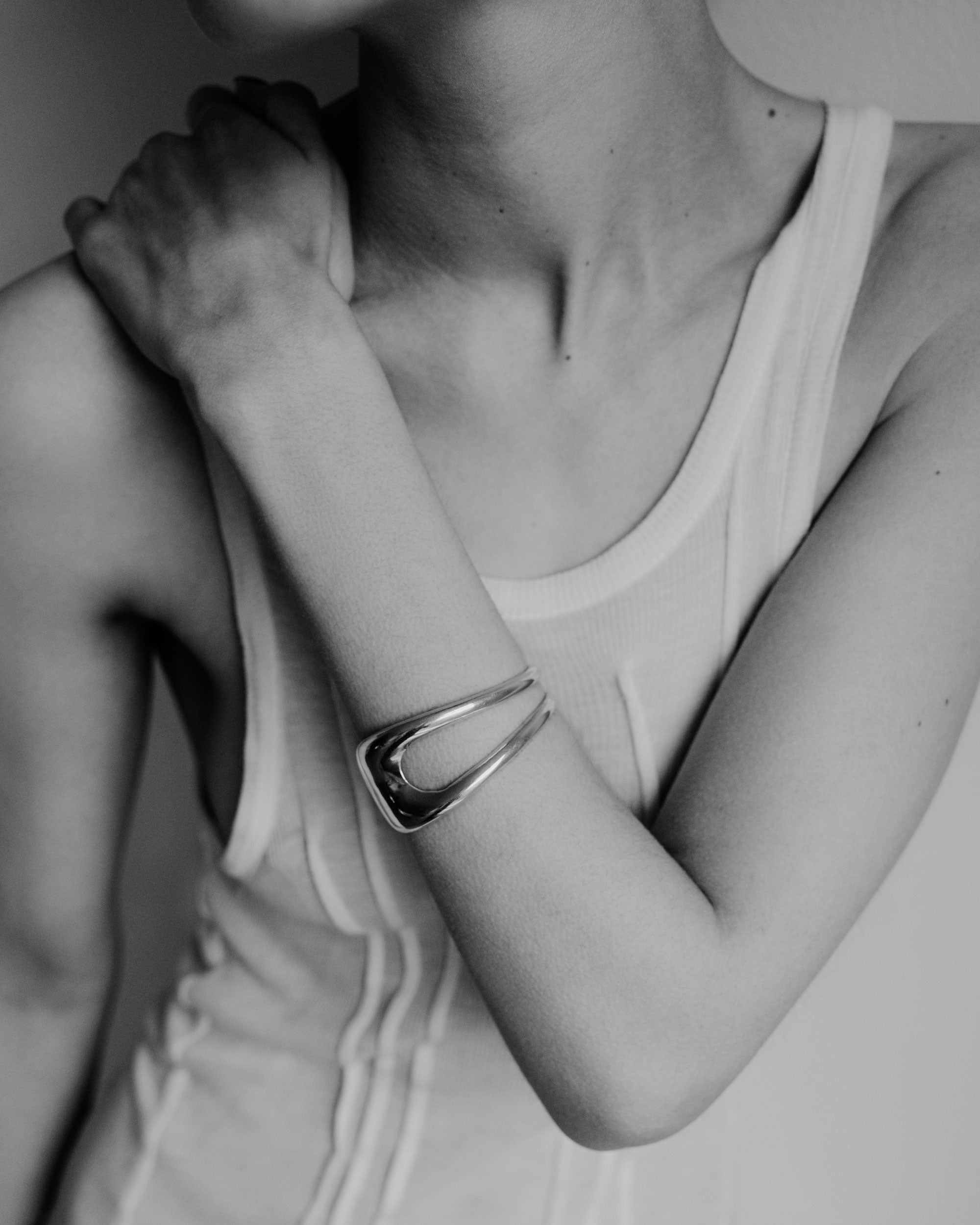 Person wearing AGMES .925 Sterling Silver Leona Cuff.