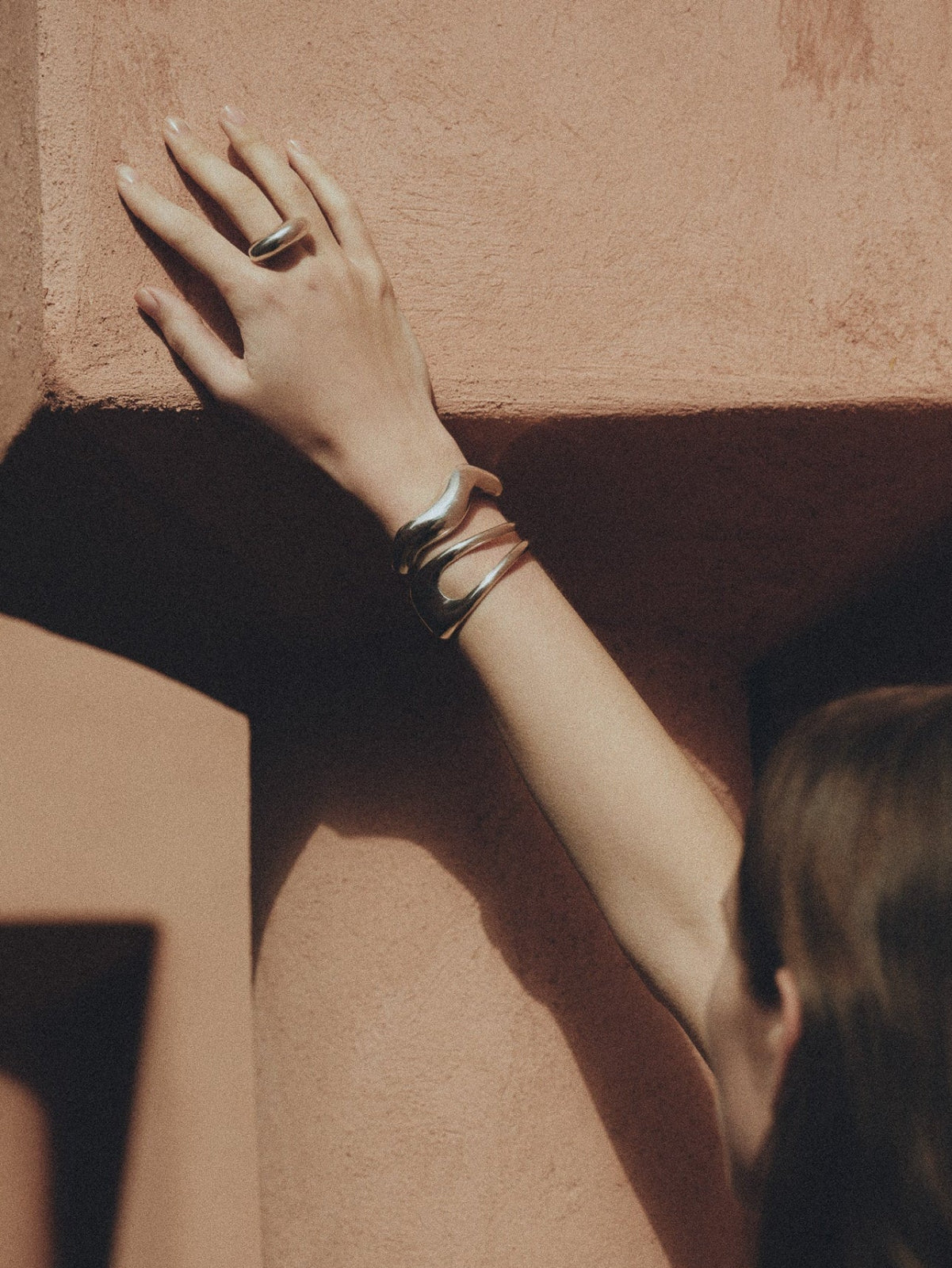 Person Wearing AGMES .925 Sterling Silver Leona and Large Astrid Cuff Set.