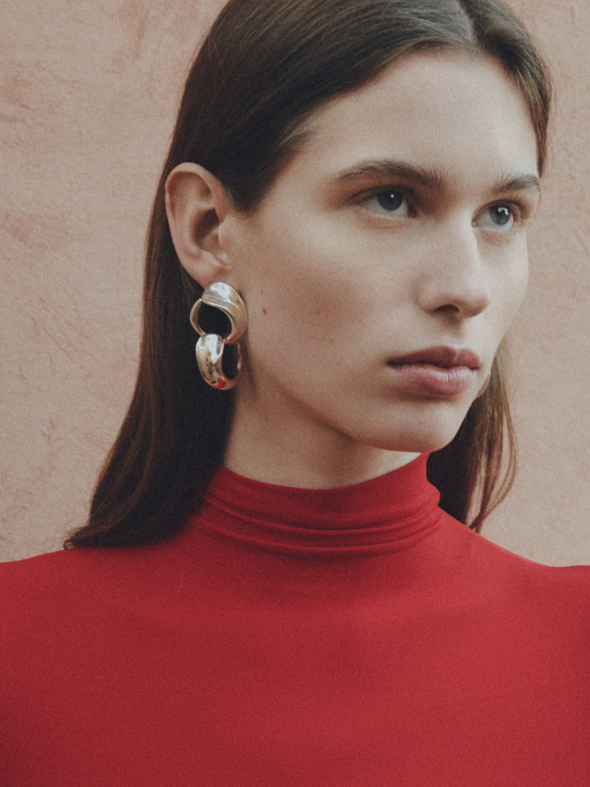 woman wearing AGMES 0.925 sterling silver long hoop Marta earrings