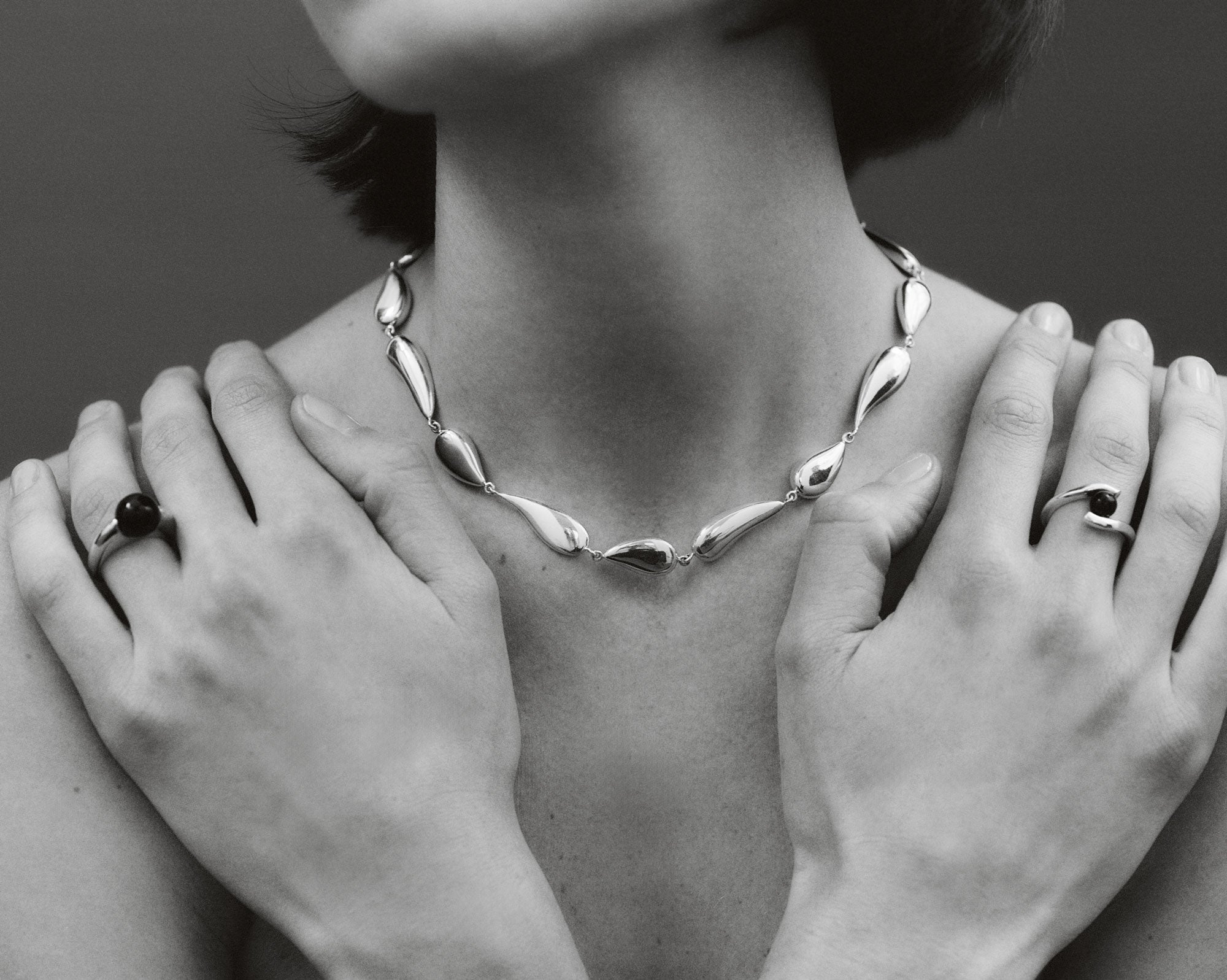 AGMES .925 Sterling Silver Claire and Chloe Ring with Onyx Stone paired with Ila Necklace.