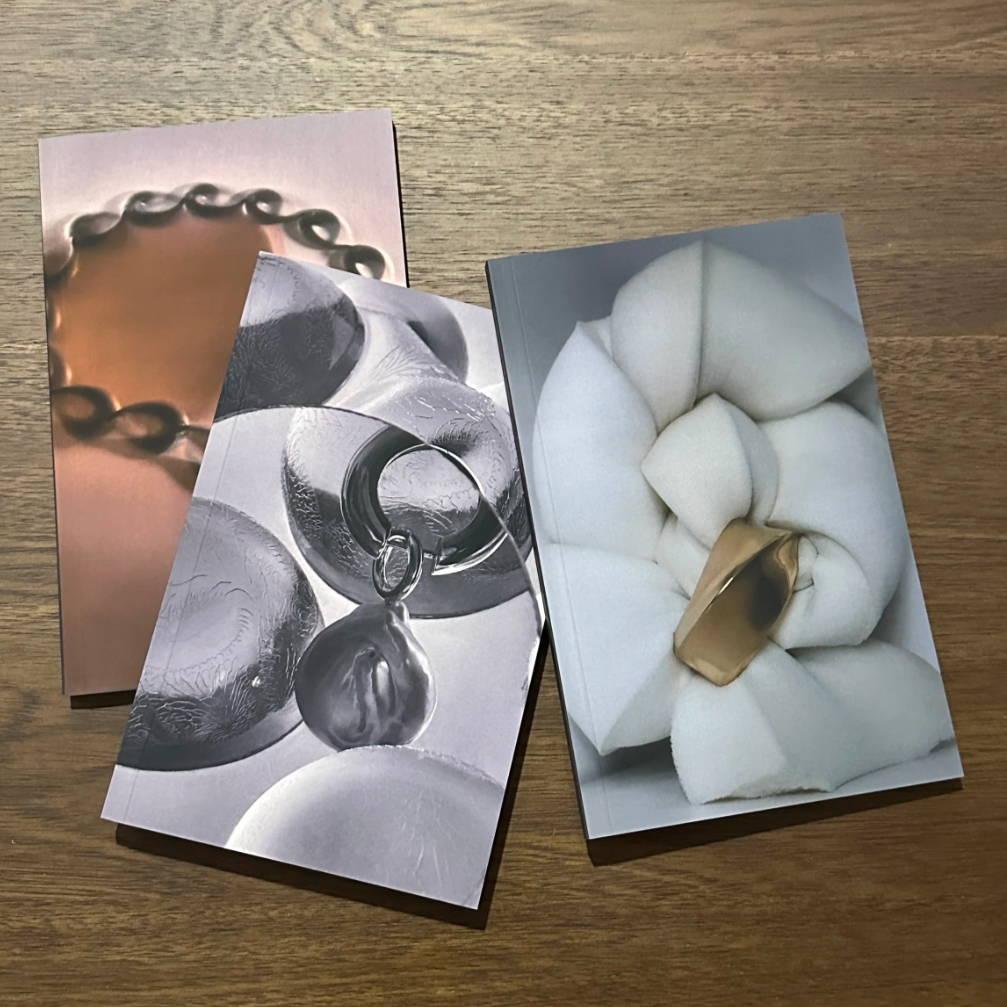 AGMES Notebook. 5" x 8" notebook.
Matte scratch resistant soft cover.