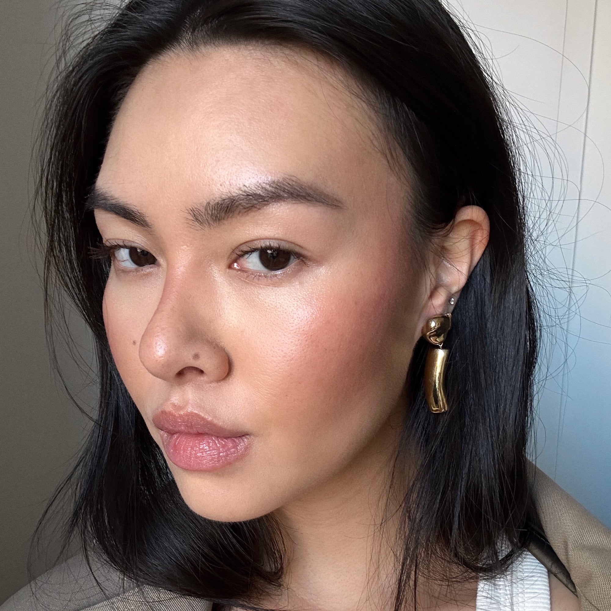 Woman wearing AGMES 18K Gold Vermeil Short Ellsworth Clip-On Earrings.