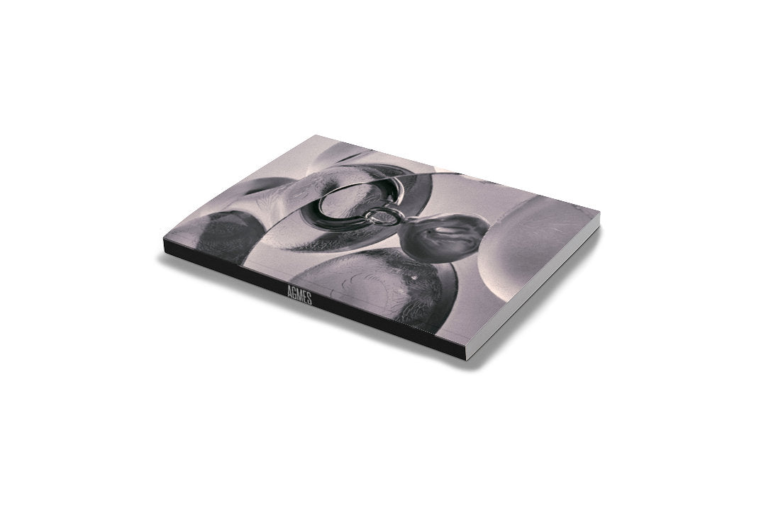 AGMES Notebook. 5" x 8" notebook.
Matte scratch resistant soft cover.