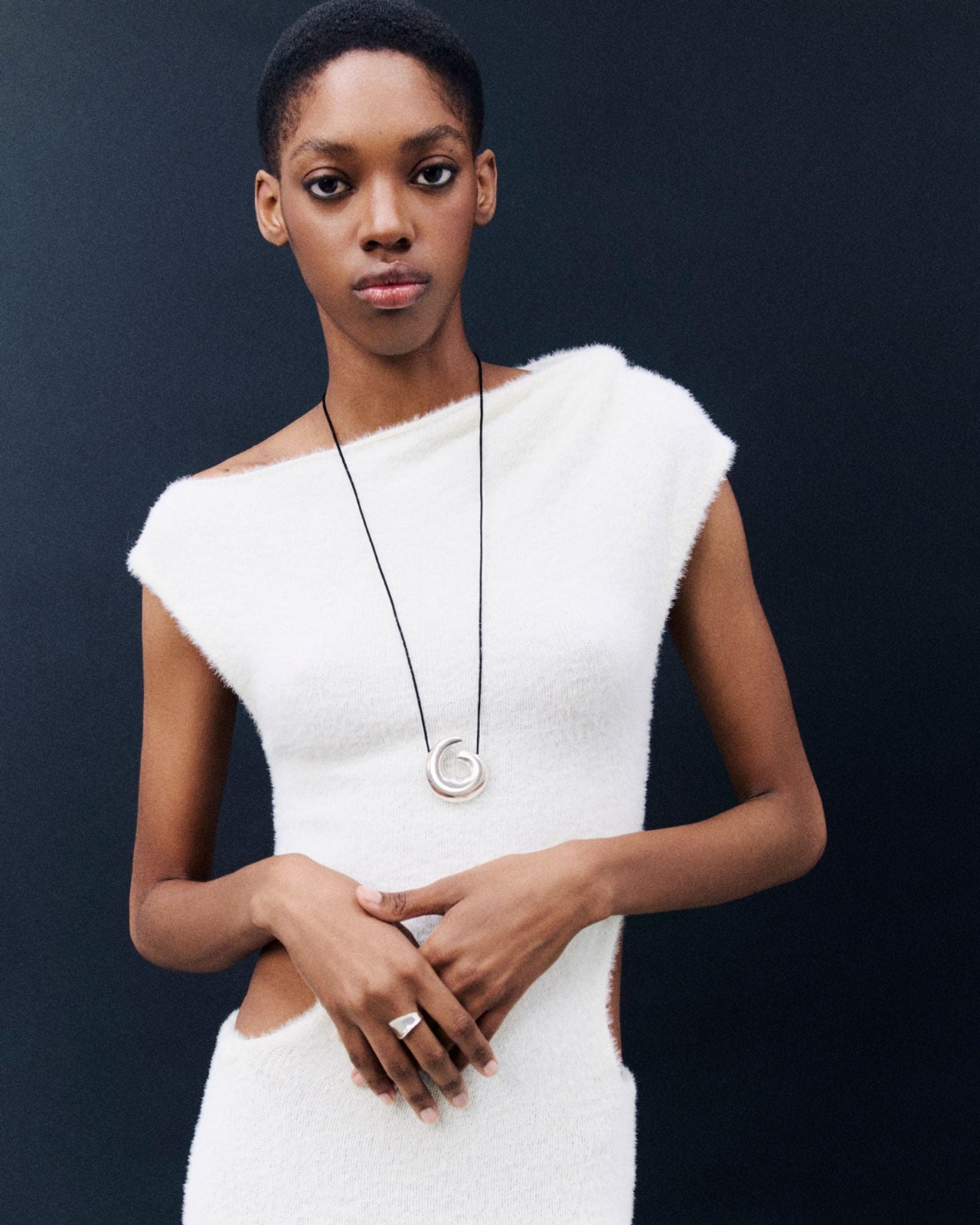 Model wearing AGMES.925 sterling silver Large Nadia Pendant