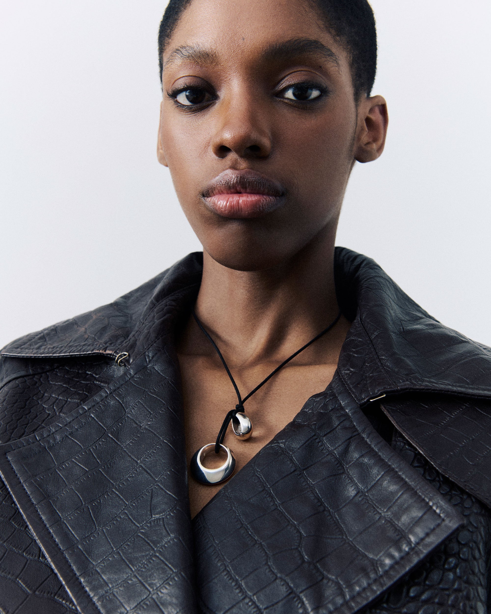Model wearing .925 sterling silver AGMES Rae Pendant on Black Suede cord