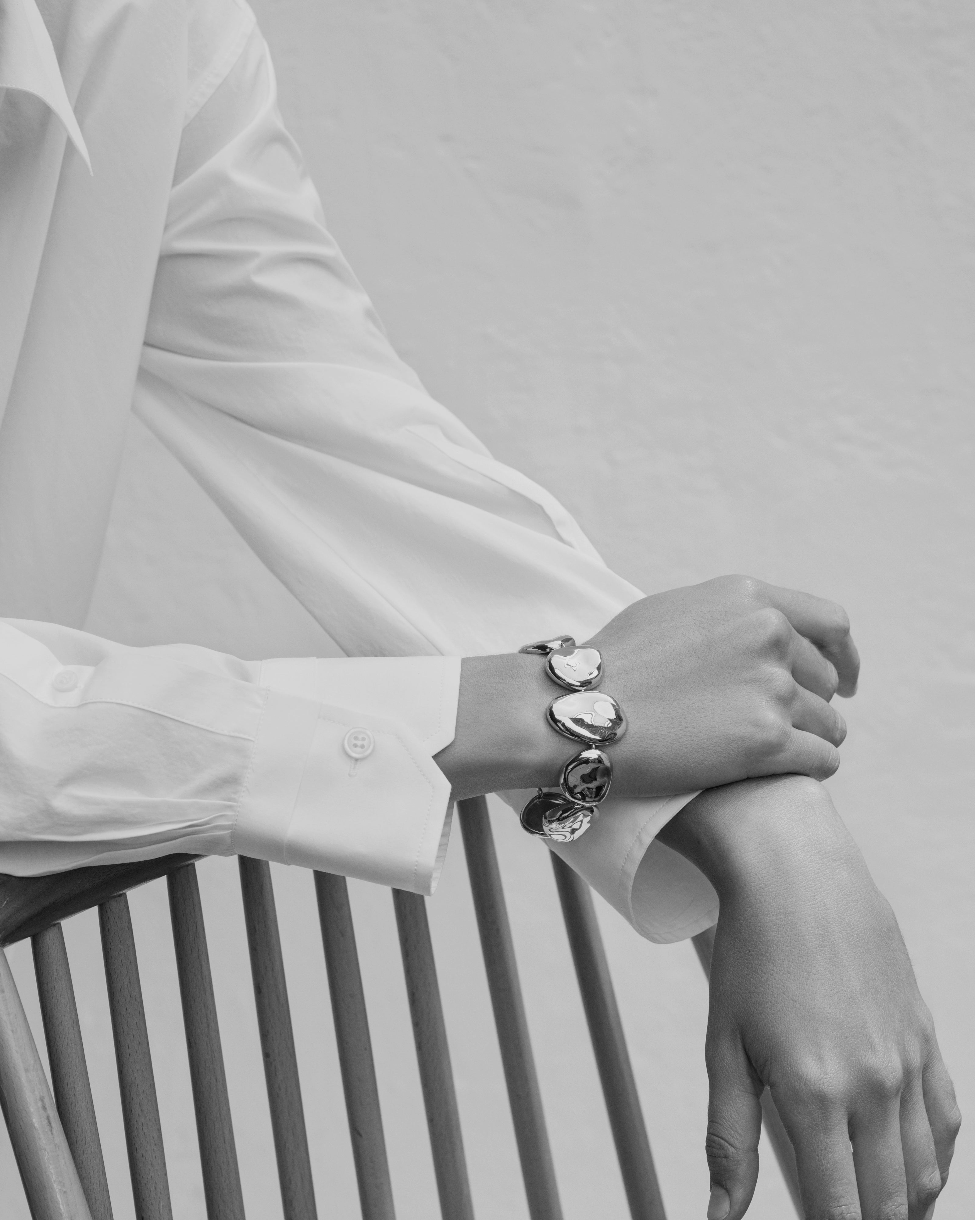 Woman wearing AGMES 0.925 sterling silver Conie Bracelet.