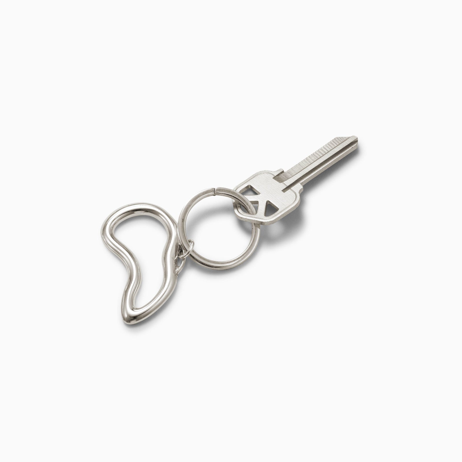 AGMES .925 sterling silver sculptural heart Sum of Parts Keychain on white background.