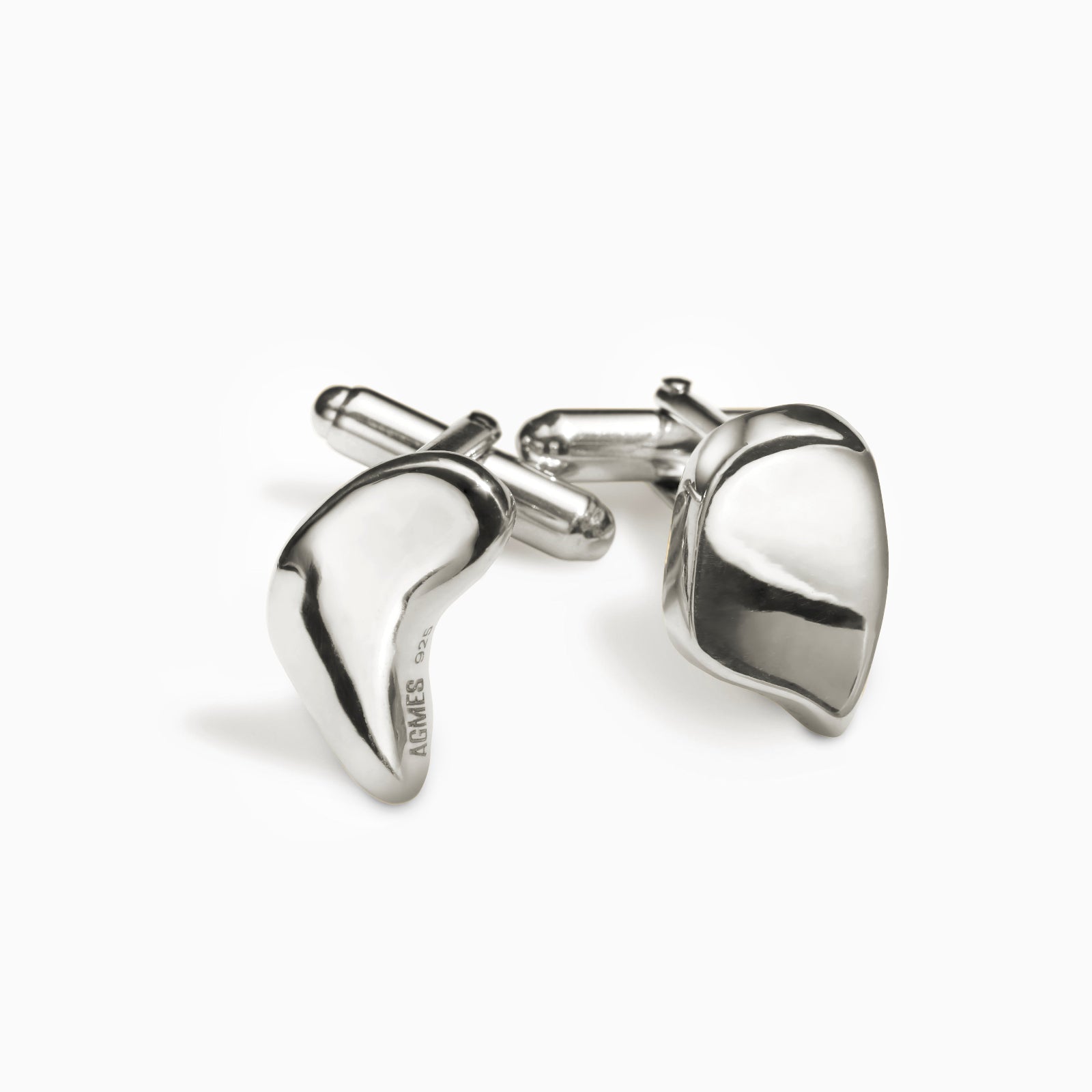 AGMES .925 sterling silver sculptural heart Sum of Parts cufflinks on white background.