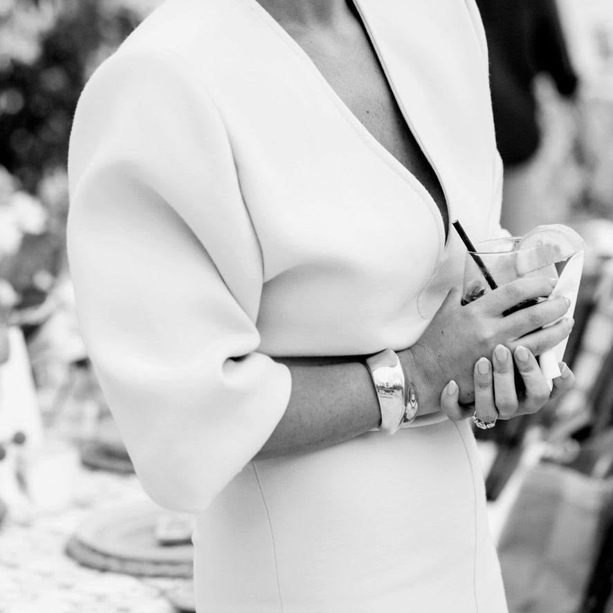 Person wearing AGMES 0.925 Sterling Silver Sculptural Twist Cuff