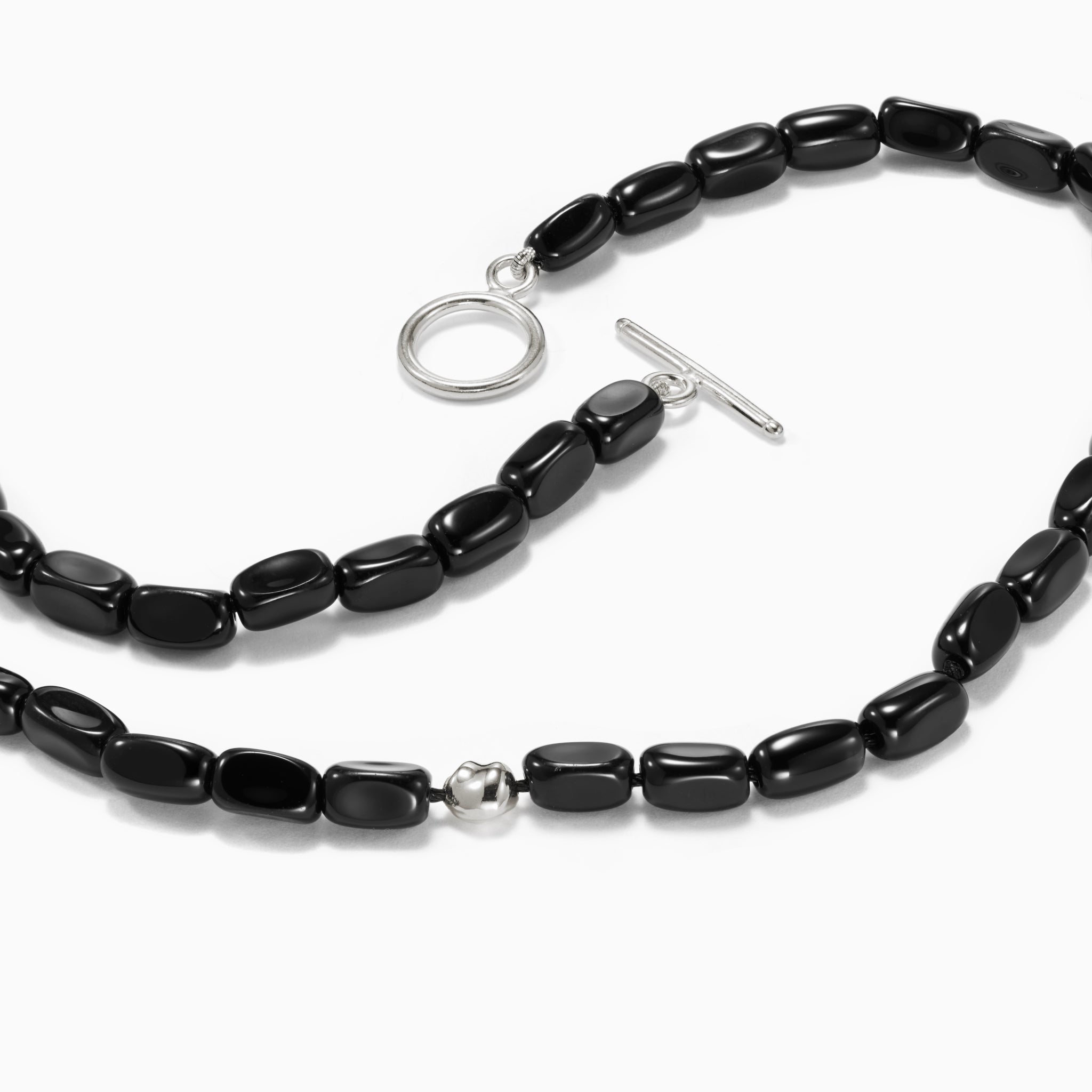 back onyx beaded necklace and bracelet set with 0.925 sterling silver accents on white background