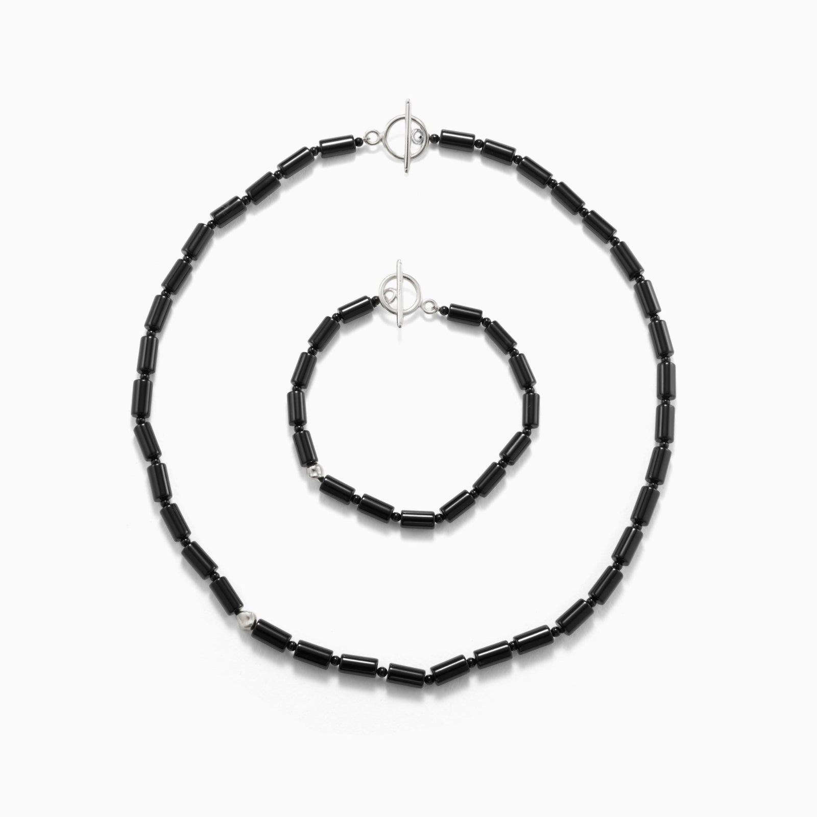 back onyx beaded necklace and bracelet set with 0.925 sterling silver accents on white background