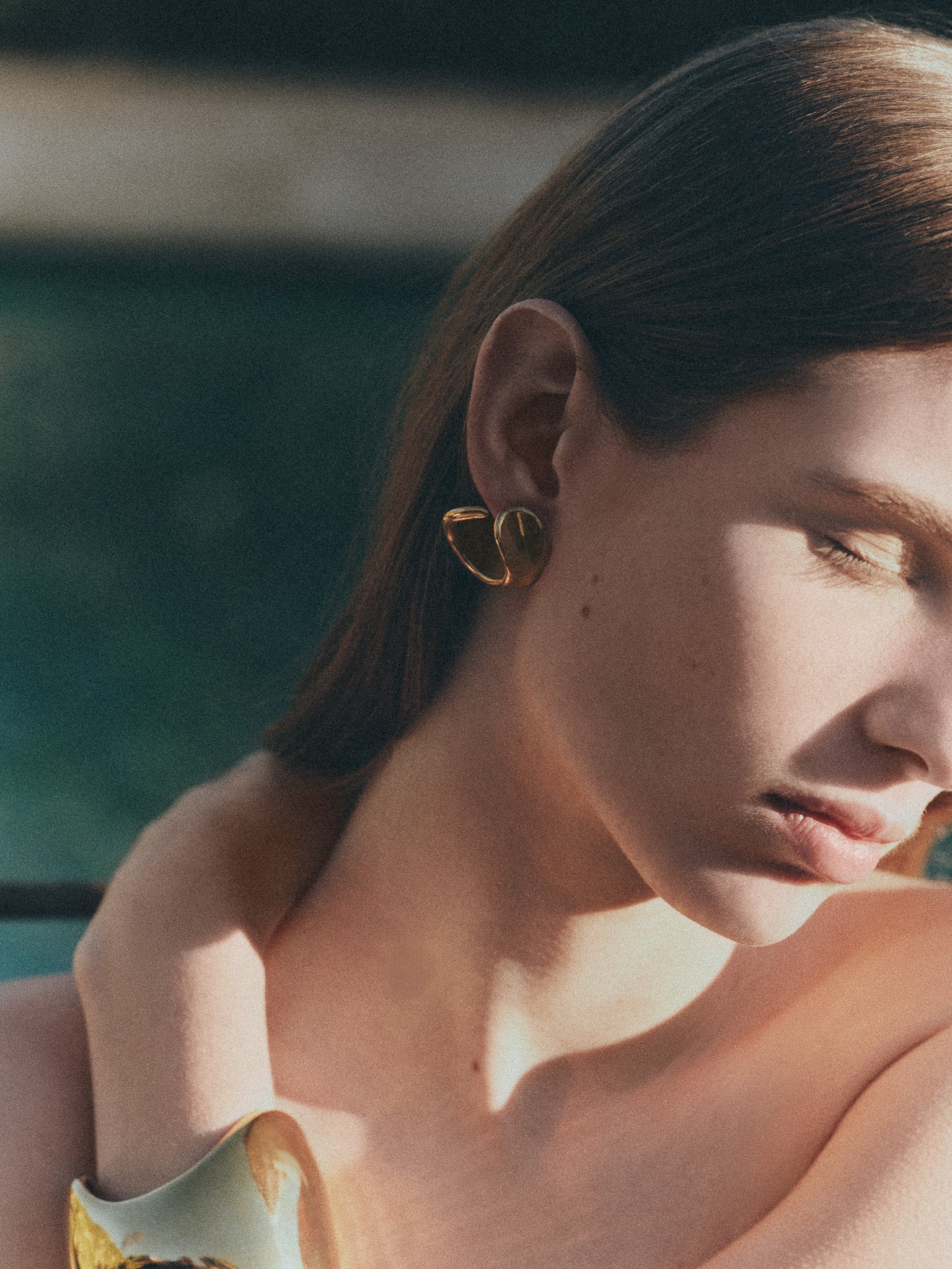 Woman wearing 18k gold vermeil AGMES Marta Hoop Earrings