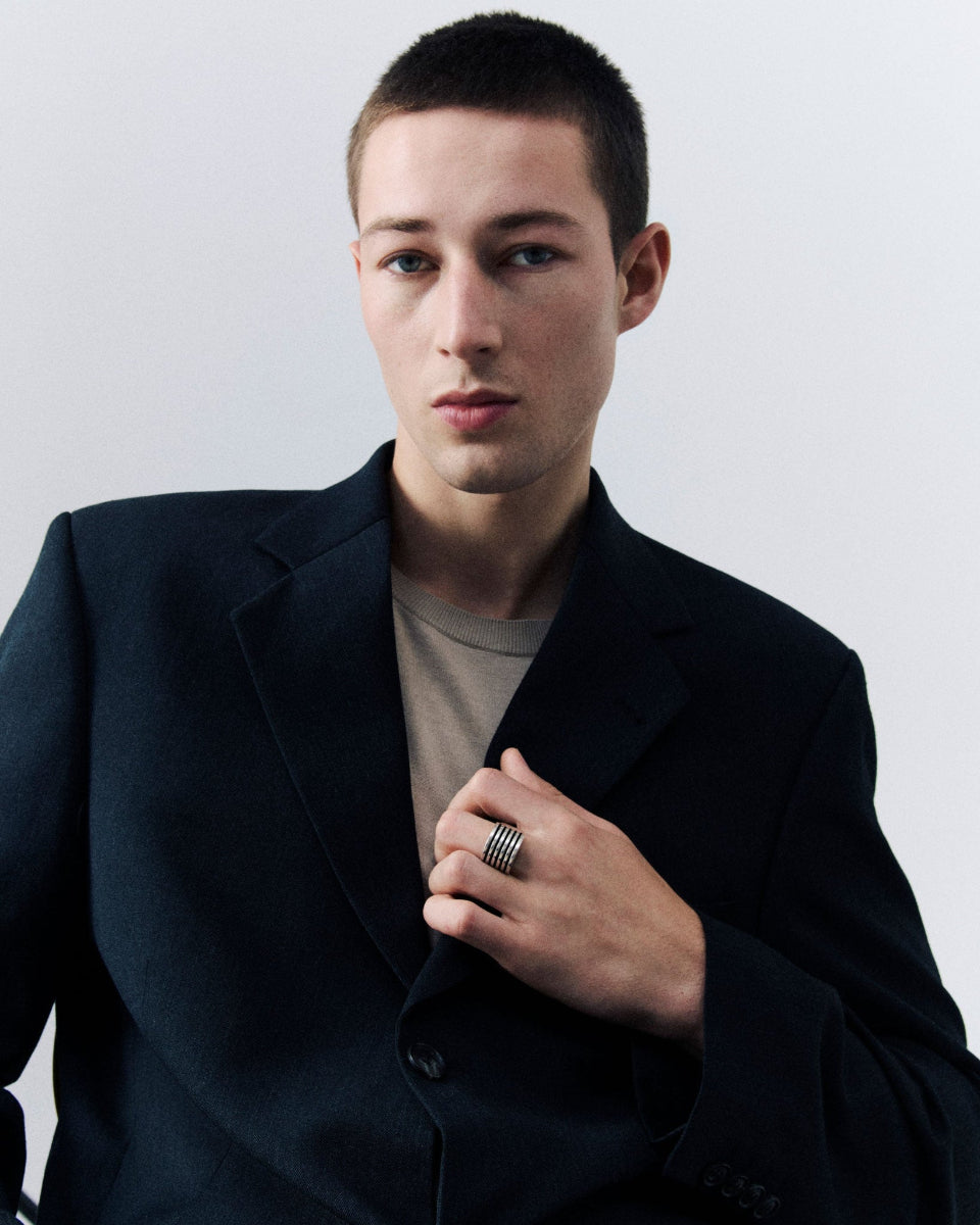Male model wearing .925 sterling silver statement Wide Boeri Ring from AGMES