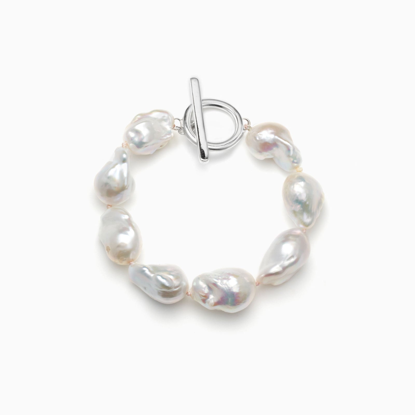 AGMES .925 sterling silver and freshwater Baroque Pearl Bracelet on white background.