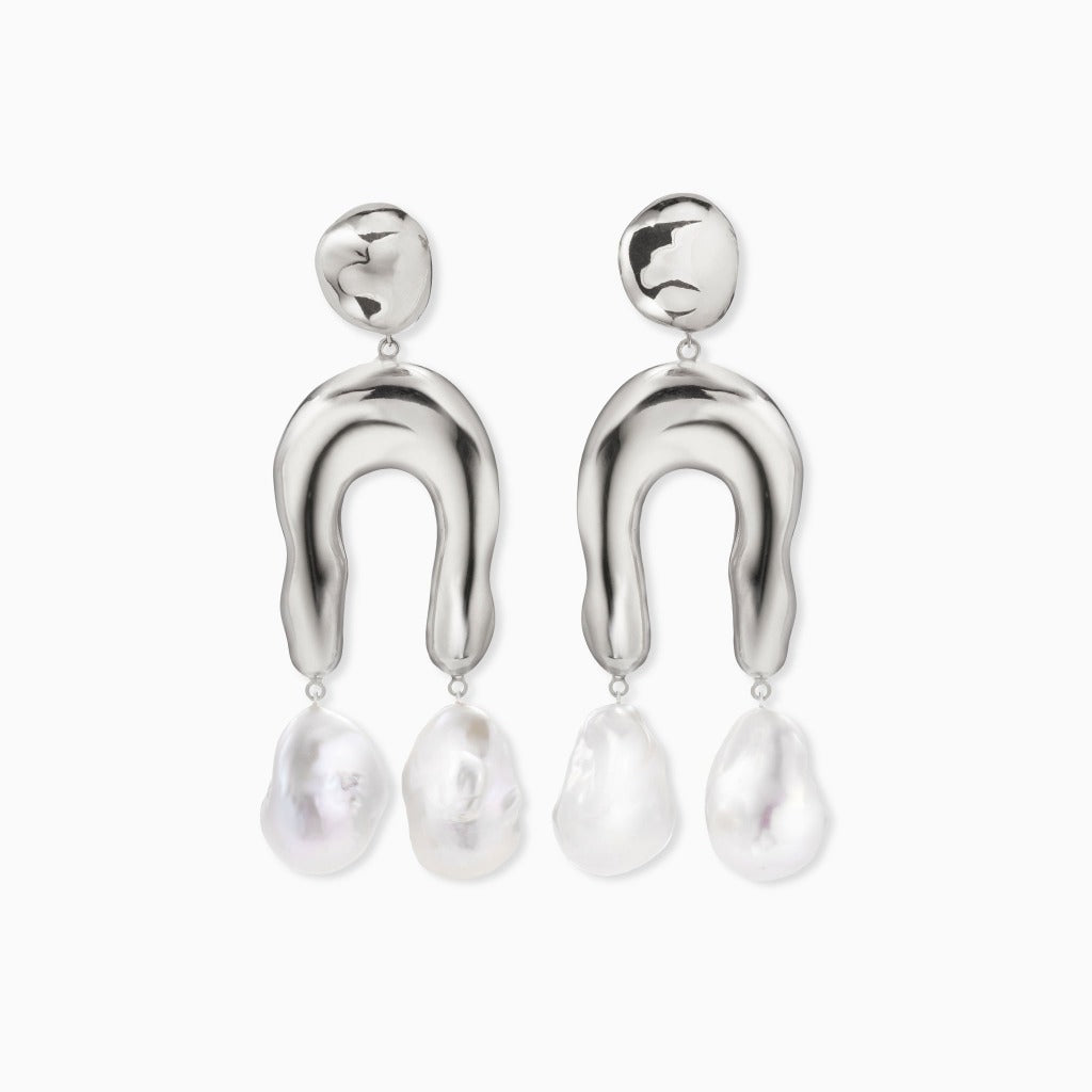 AGMES 0.925 sterling silver earrings with sculpted wishbone and freshwater pearl drop on white background.