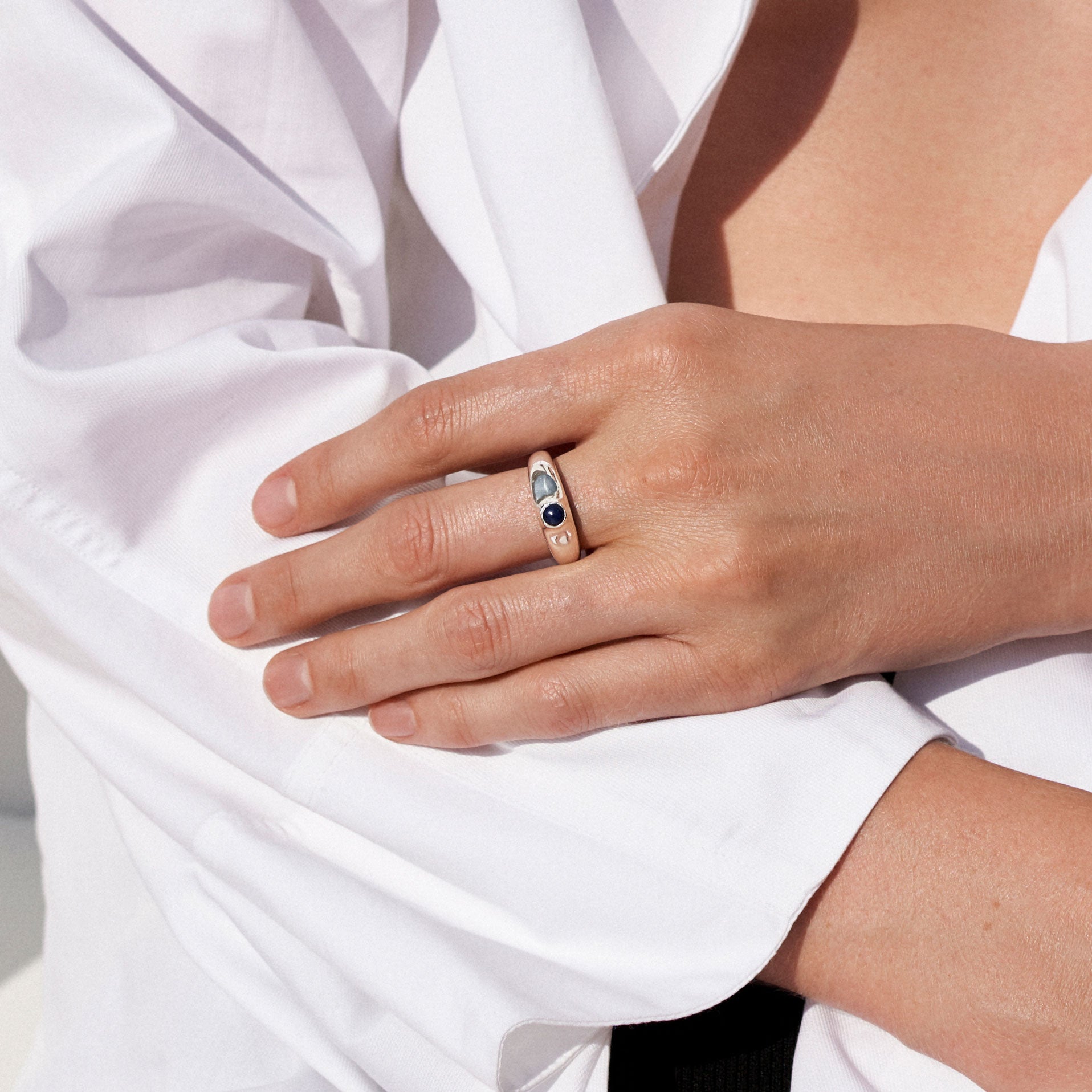 AGMES .925 Sterling Silver Cara Ring with Lapis Stone center.