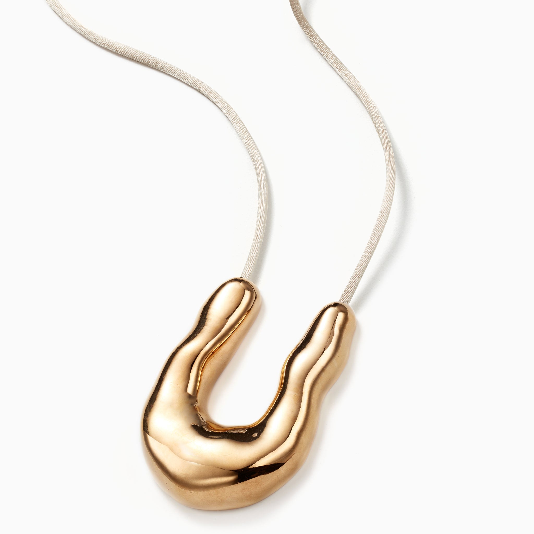 AGMES 18K Gold Vermeil Large Wishbone Pendant on Ivory Satin Cord.