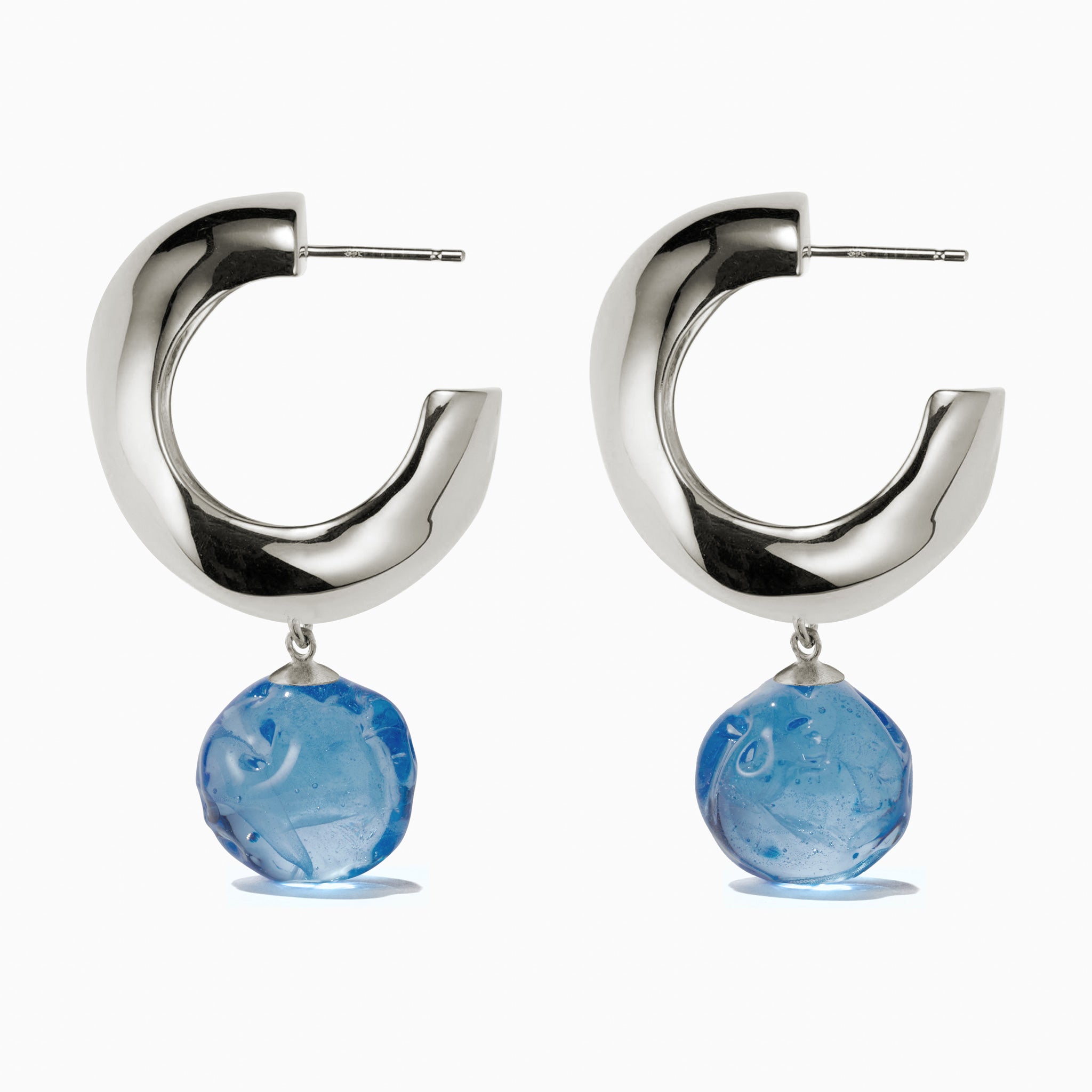 AGMES 0.925 sterling silver medium Cleo hoop earrings with blue glass bead drop on white background.