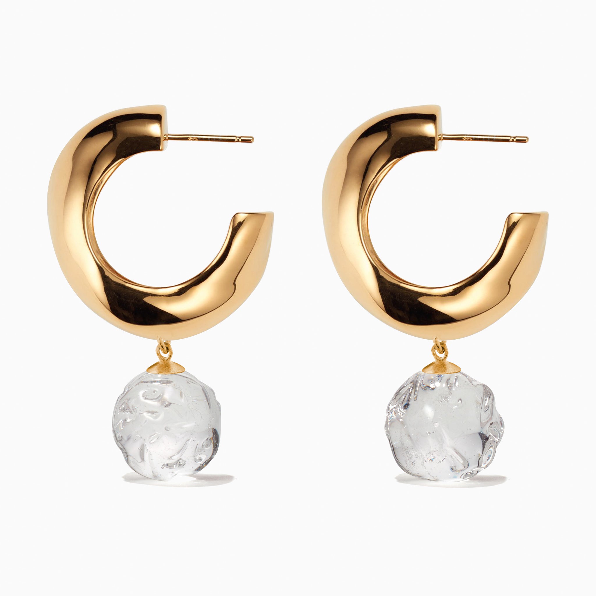 AGMES yellow gold vermeil medium Cleo hoop earrings with clear glass bead on white background.